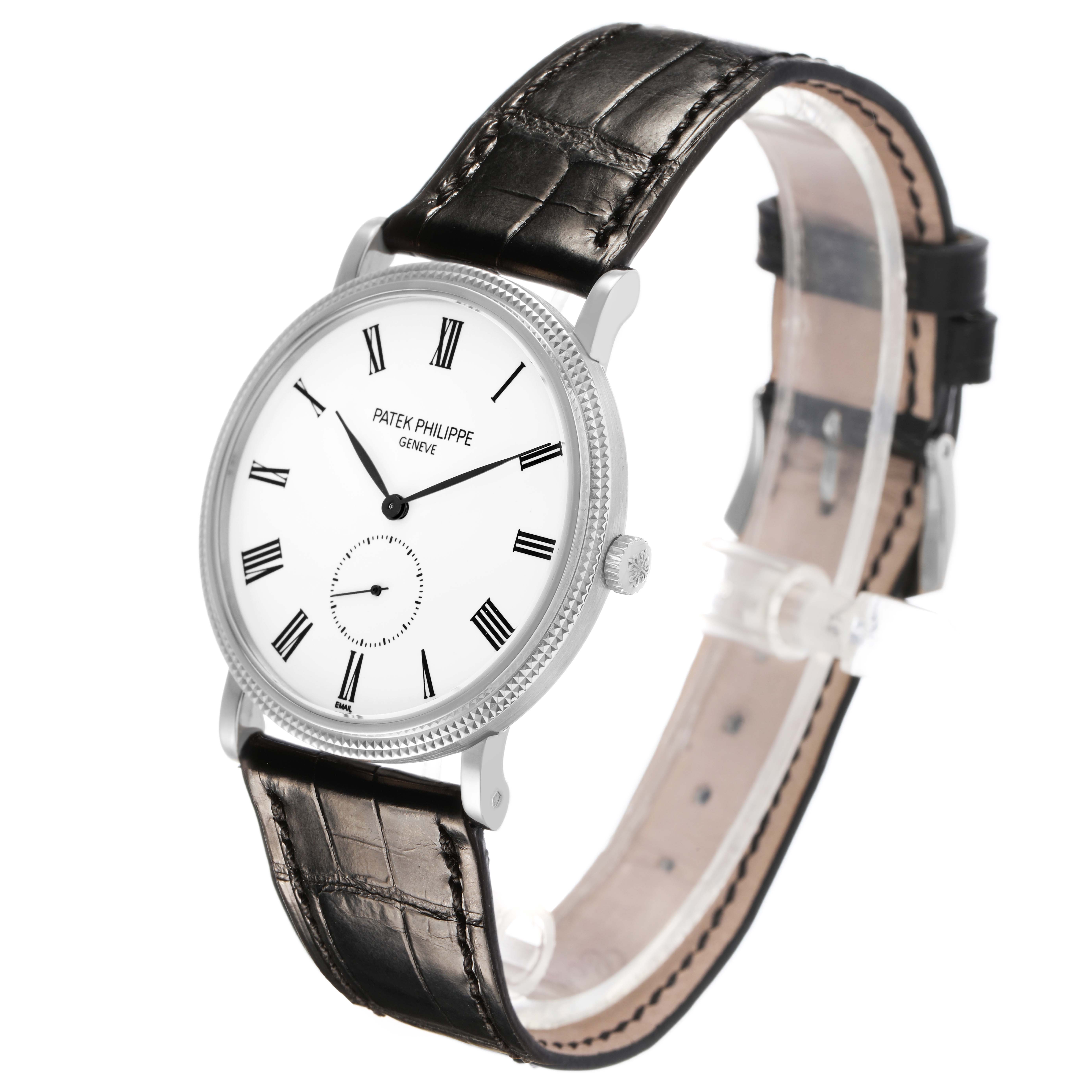 The Patek Philippe Calatrava 5116 Men's White Gold White Dial watch is shown at a three-quarter angle, highlighting the dial, bezel, crown, and leather strap.