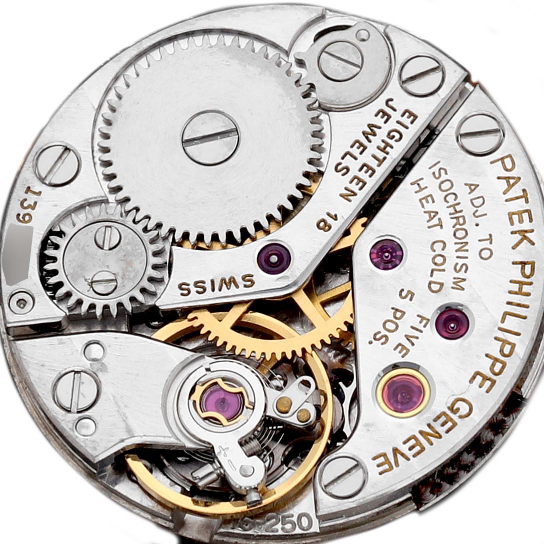 The image shows the intricate movement components of the Patek Philippe Golden Ellipse 4133 Women's White Gold White Dial 4133 Women's White Gold White Dial watch from a top-down view.