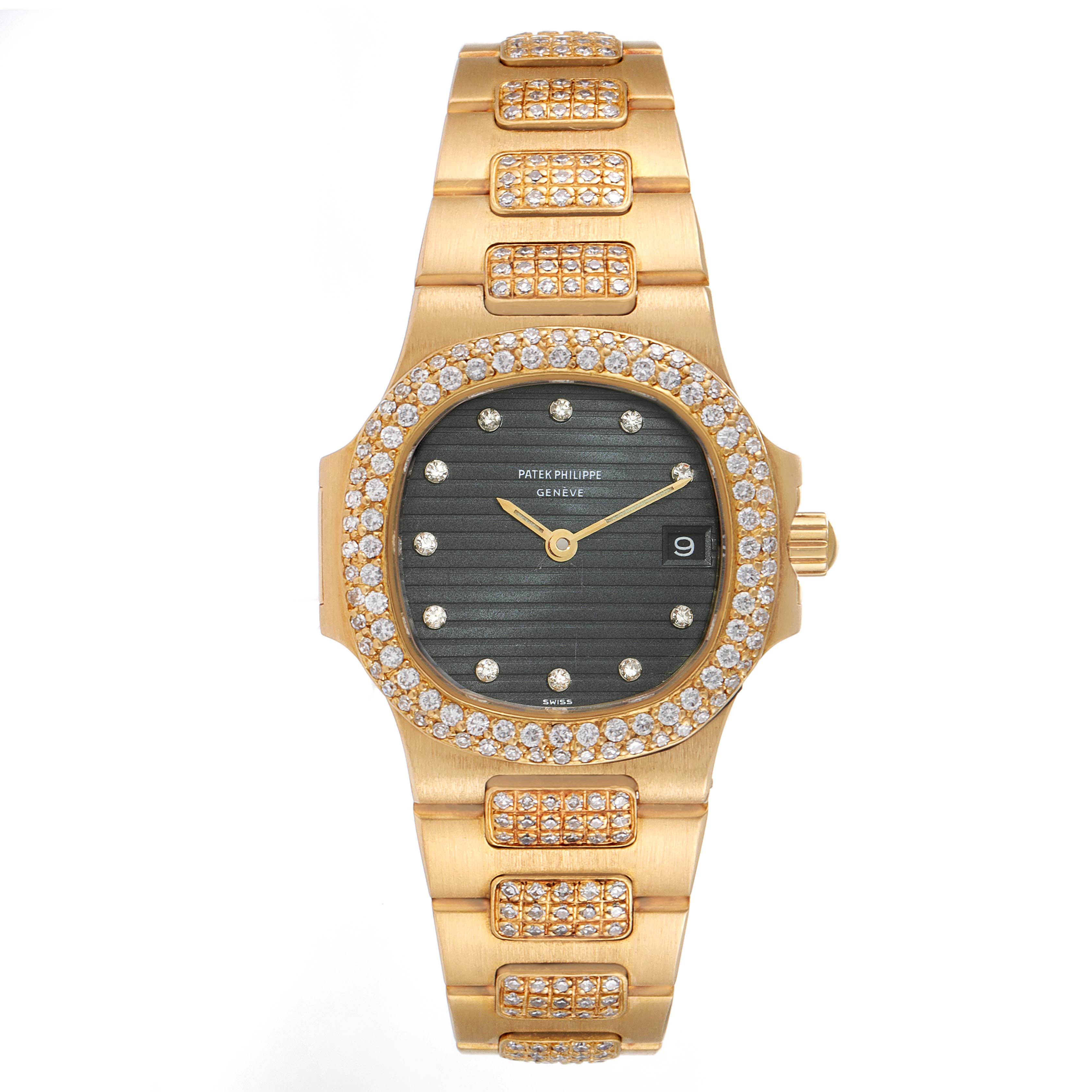 This Patek Philippe Nautilus 4700/G Women's Yellow Gold Black Dial 4700/G Women's Yellow Gold Black Dial watch is shown from a top-down angle, highlighting its diamond-studded bezel and bracelet.