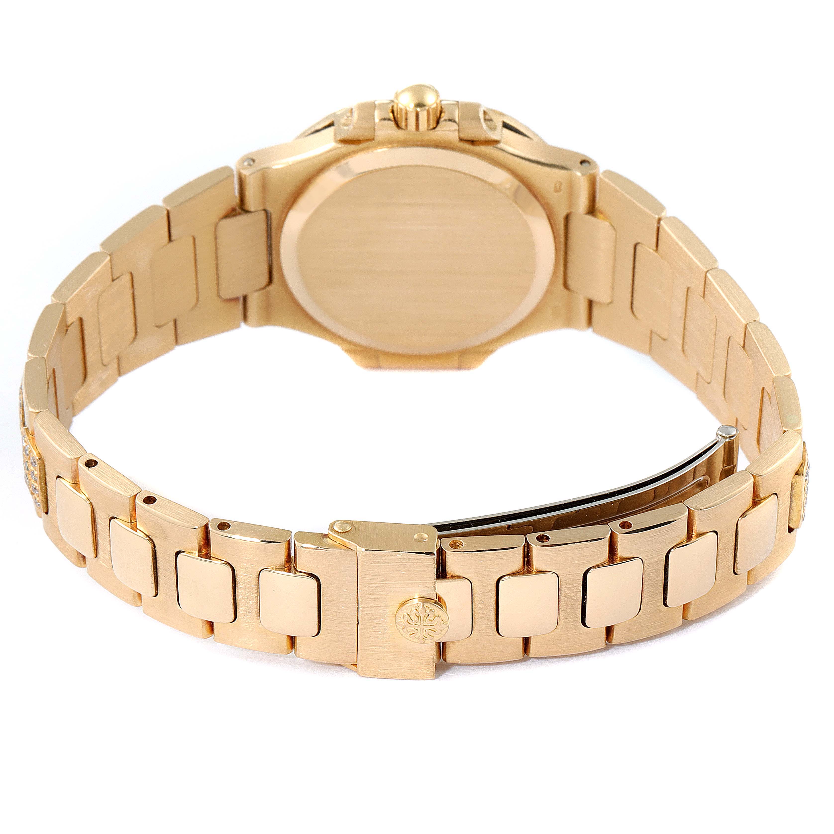 The image shows the back view of a Patek Philippe Nautilus 4700/G Women's Yellow Gold Black Dial 4700/G Women's Yellow Gold Black Dial watch, displaying its bracelet, clasp, and case back.