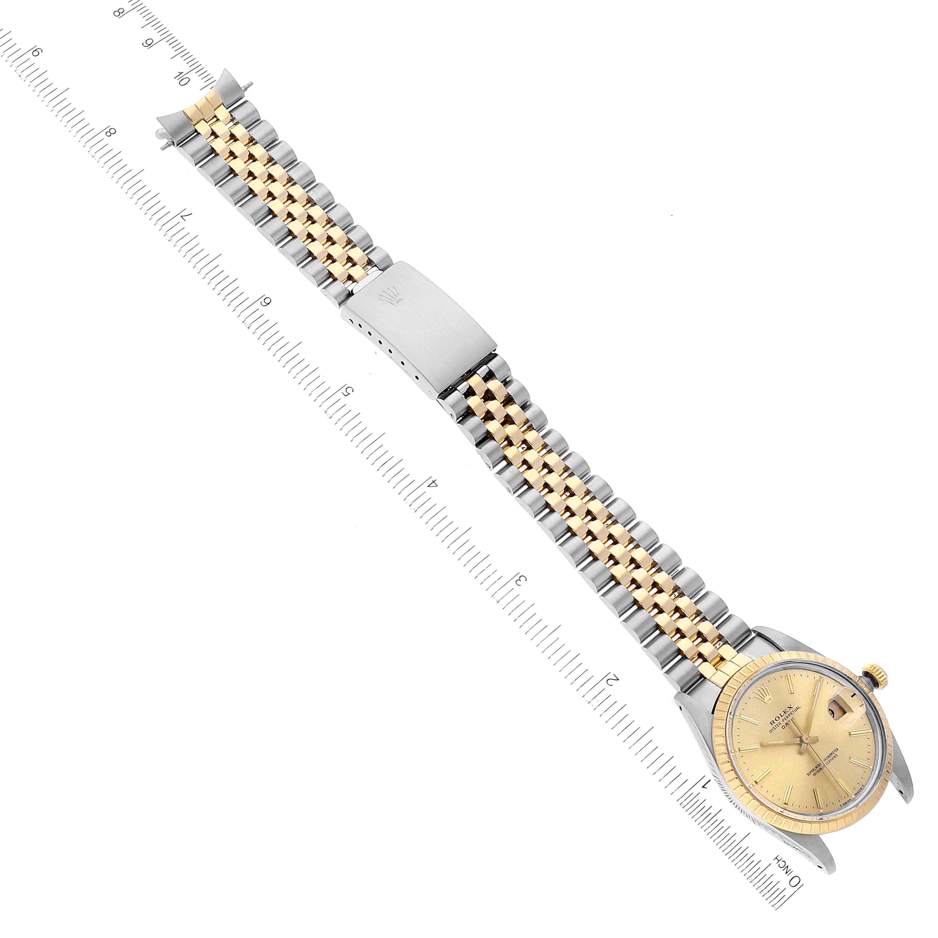 The image shows a Rolex Date 15053 Men's Steel and Gold (two tone) Champagne Dial 15053 Men's Steel and Gold (two tone) Champagne Dial model watch laid flat, highlighting its gold and silver metal bracelet and yellow-gold dial.