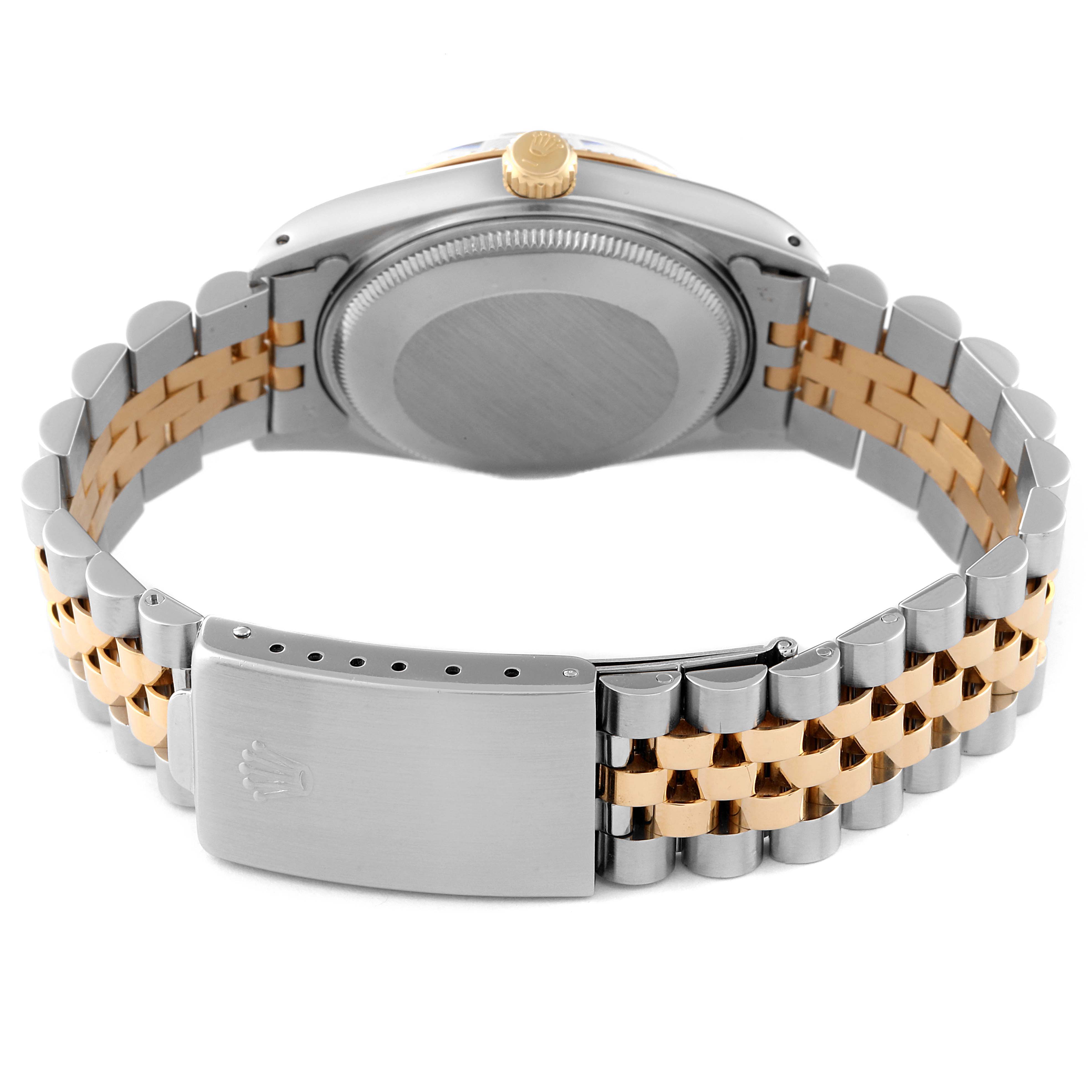 The image shows the back and bracelet of the Rolex Date 15053 Men's Steel and Gold (two tone) Champagne Dial 15053 Men's Steel and Gold (two tone) Champagne Dial model watch, highlighting its two-tone metal design and clasp.