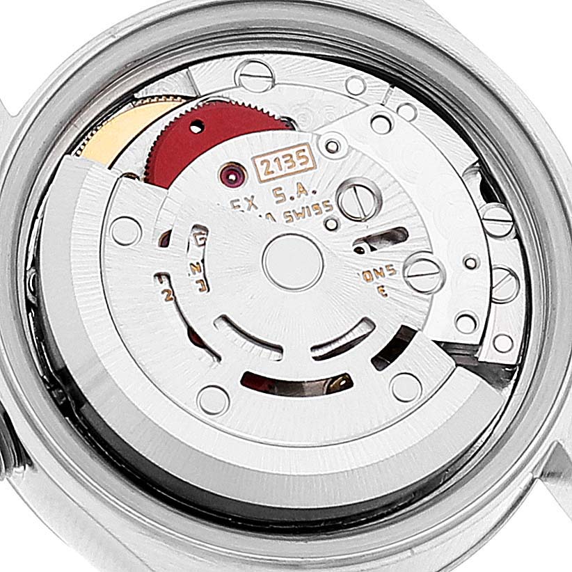 The image shows the internal mechanism of a Rolex Datejust 69173 Women's Steel and Gold (two tone) White Dial 69173 Women's Steel and Gold (two tone) White Dial watch, highlighting the movement components from the back.