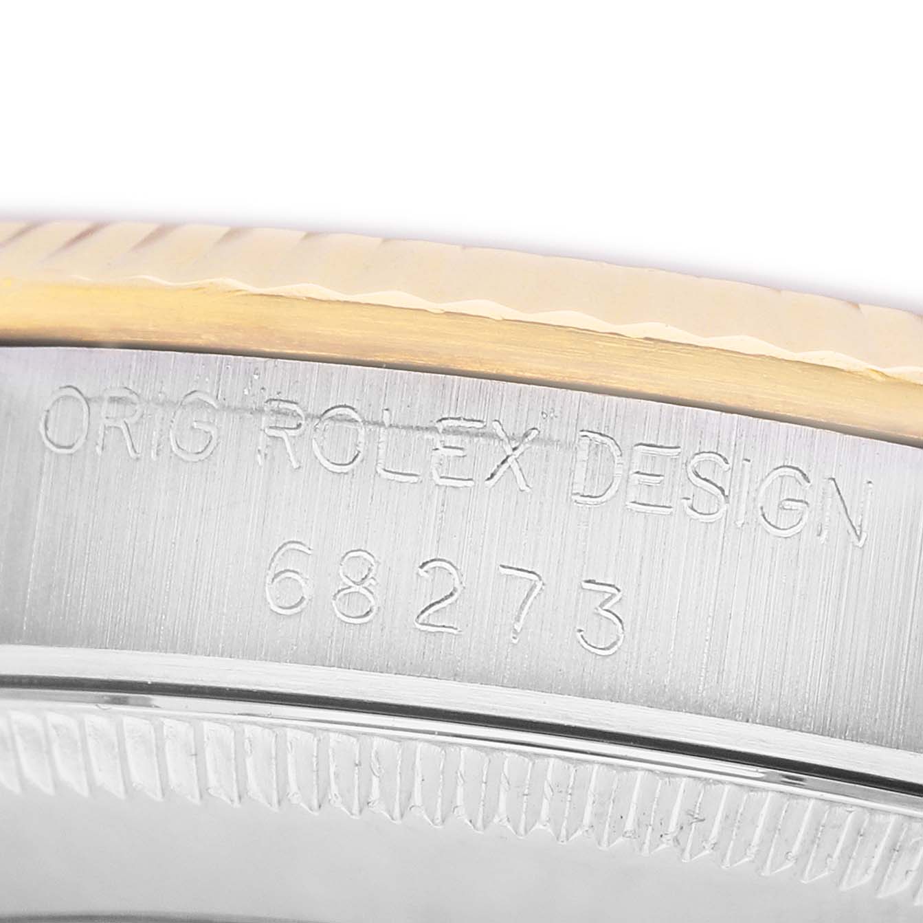 The image shows a close-up of the side engraving on the case of a Rolex Datejust 68273 Women's Stainless Steel White Dial watch, displaying the model number.