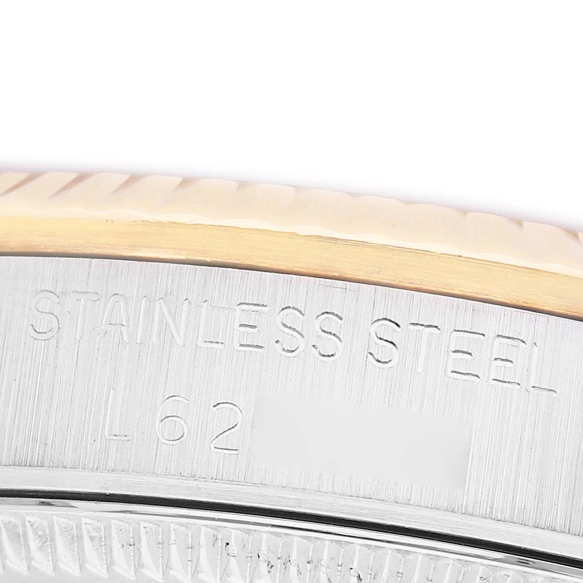 The image shows a close-up of a Rolex Datejust 68273 Women's Stainless Steel White Dial watch edge, highlighting the stainless steel and gold bezel.