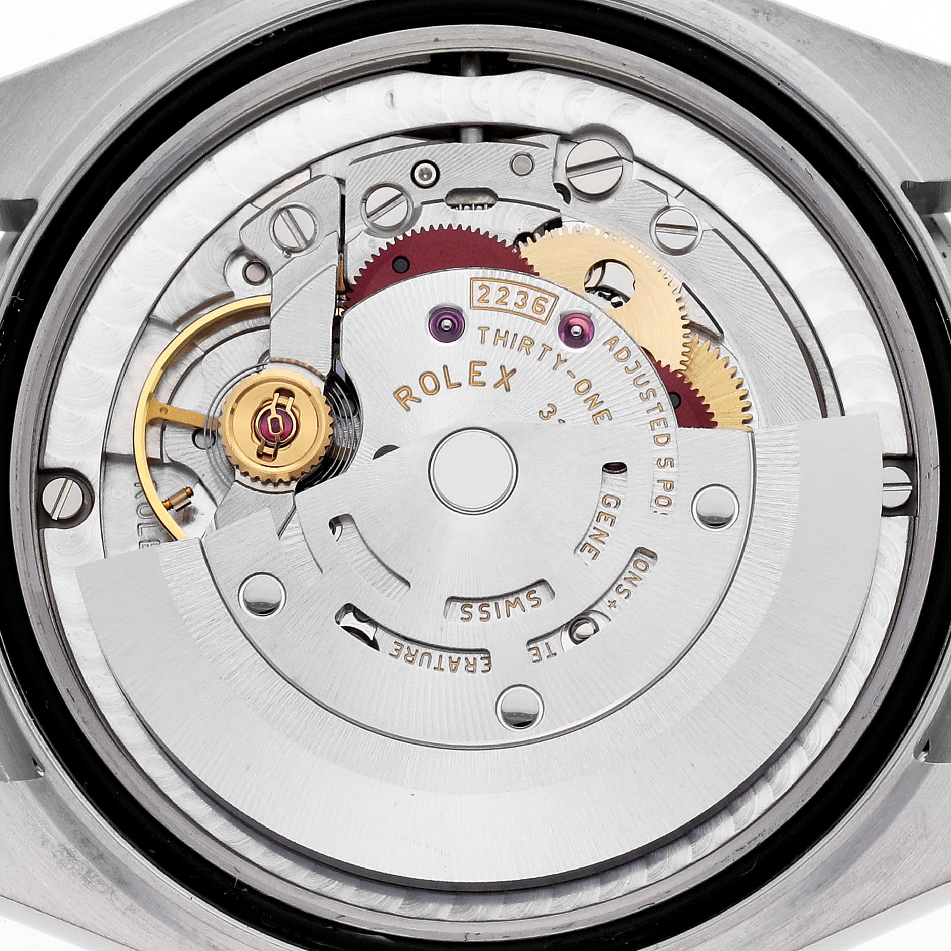 This image shows the movement of a Rolex Datejust watch from the back, highlighting its intricate mechanical components.