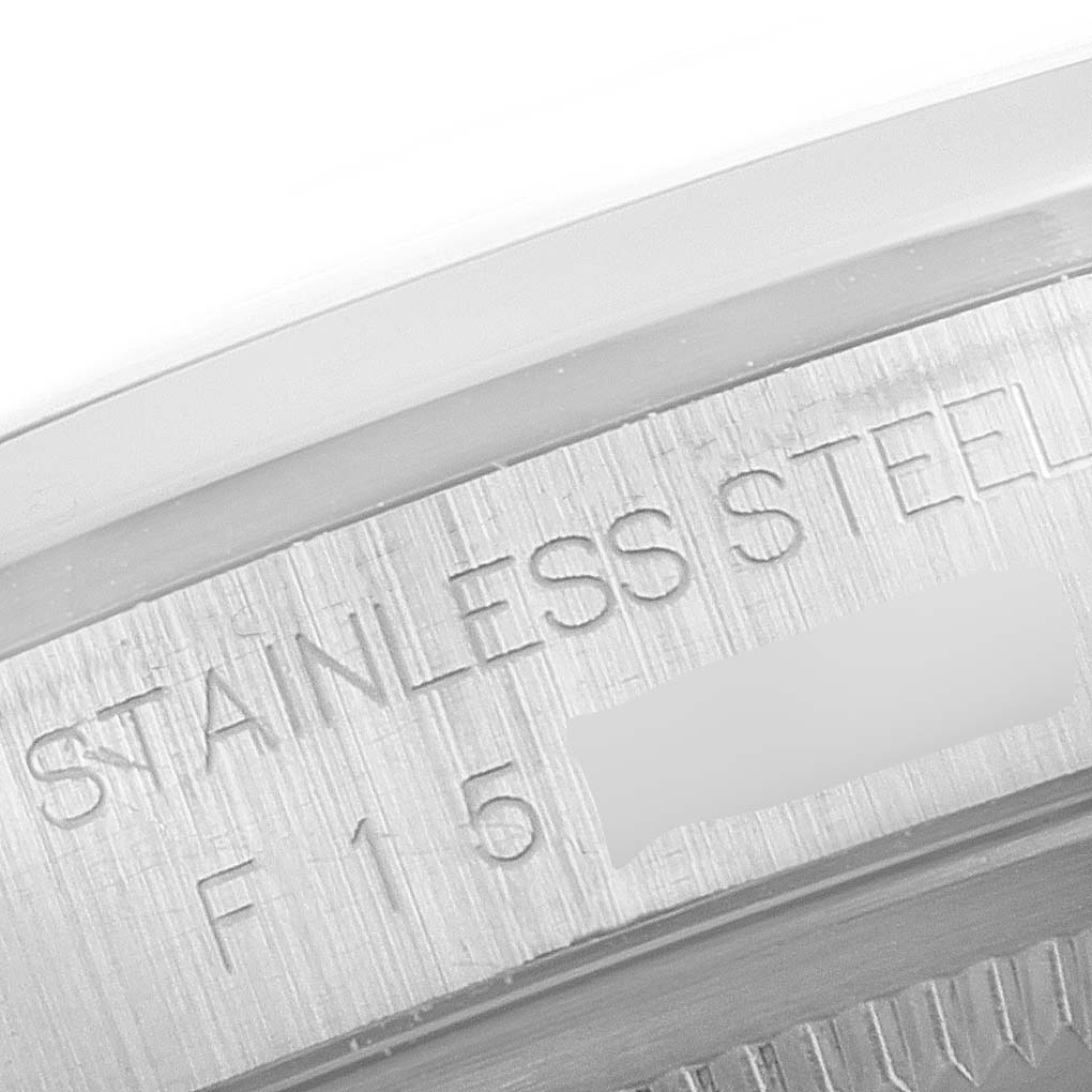 This image shows a close-up of the stainless steel engraving on the side of a Rolex Datejust 16200 Men's Stainless Steel Silver Dial 16200 Men's Stainless Steel Silver Dial watch case.