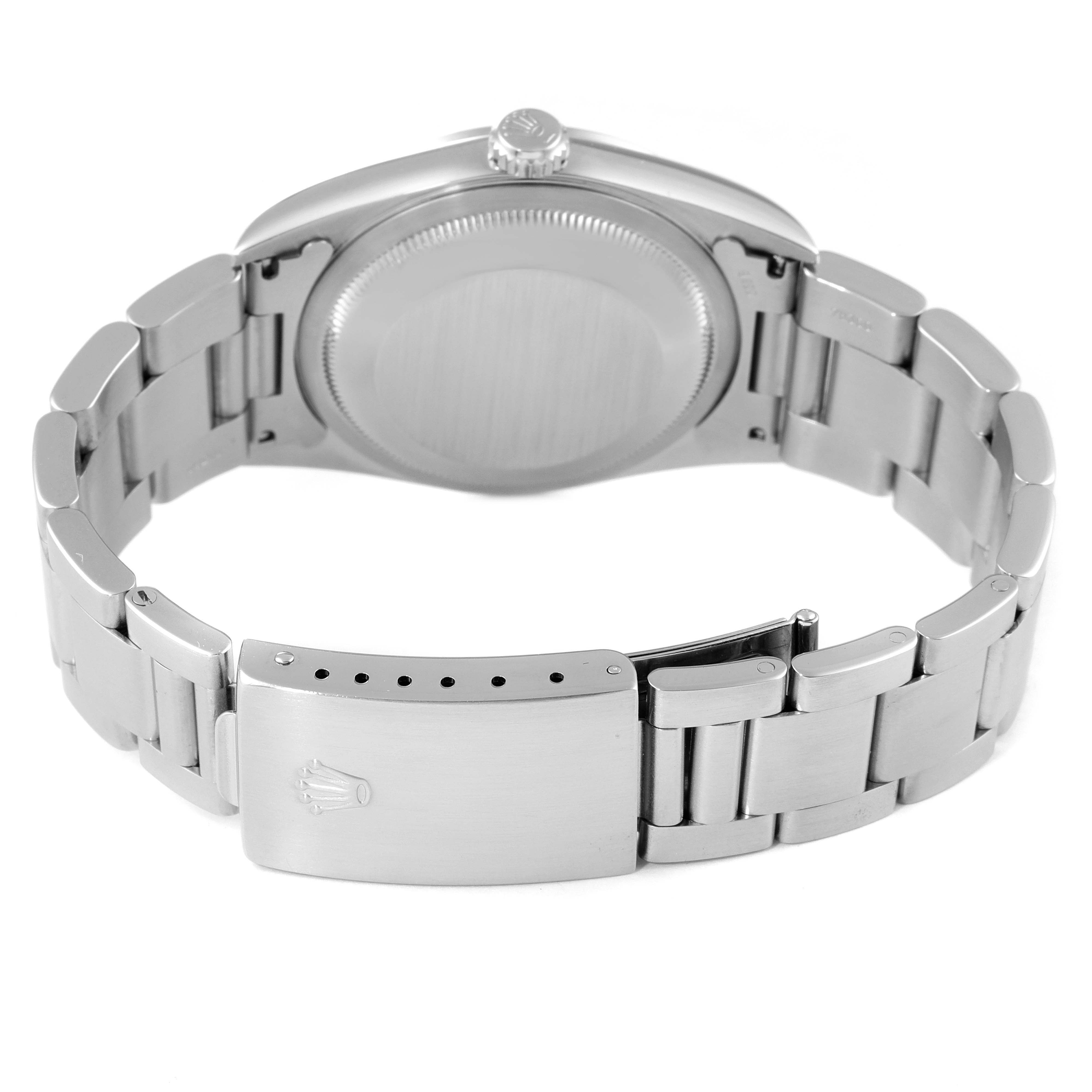 The image shows the back case, crown, and bracelet clasp of a Rolex Datejust 16200 Men's Stainless Steel Silver Dial 16200 Men's Stainless Steel Silver Dial watch at an angled rear view.