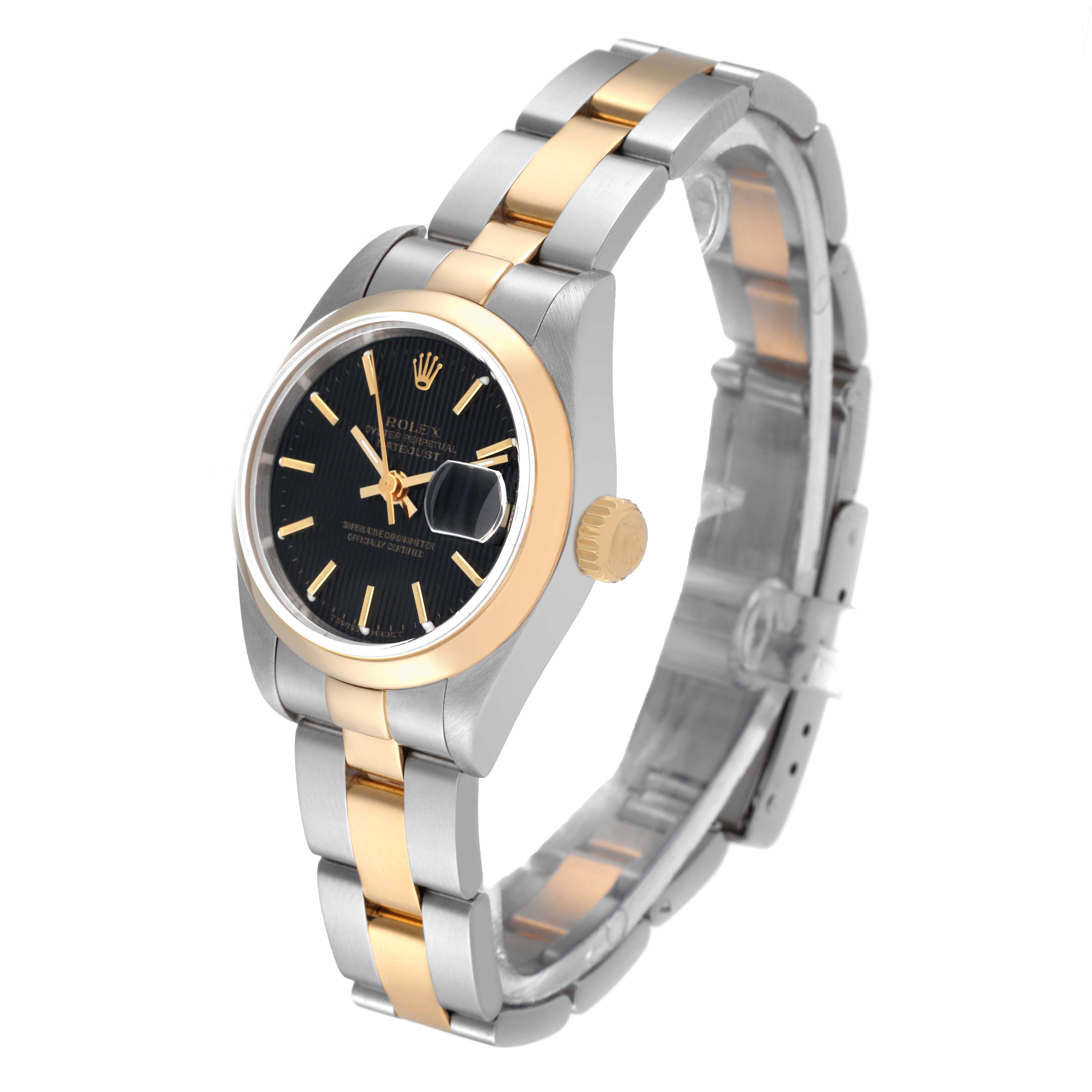 The image shows a side angle of a Rolex Datejust 69163 Women's Steel and Gold (two tone) Black Dial 69163 Women's Steel and Gold (two tone) Black Dial watch highlighting the dial, crown, and two-tone bracelet.