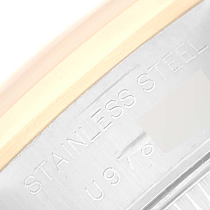 The image shows a close-up of the stainless steel engraving on the case back edge of a Rolex Datejust 69163 Women's Steel and Gold (two tone) Black Dial 69163 Women's Steel and Gold (two tone) Black Dial watch.