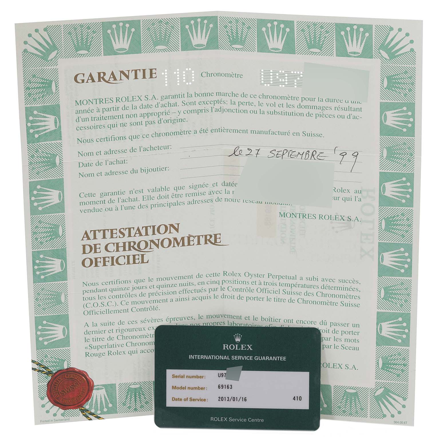 The image displays a warranty card and service guarantee for a Rolex Datejust 69163 Women's Steel and Gold (two tone) Black Dial 69163 Women's Steel and Gold (two tone) Black Dial watch.