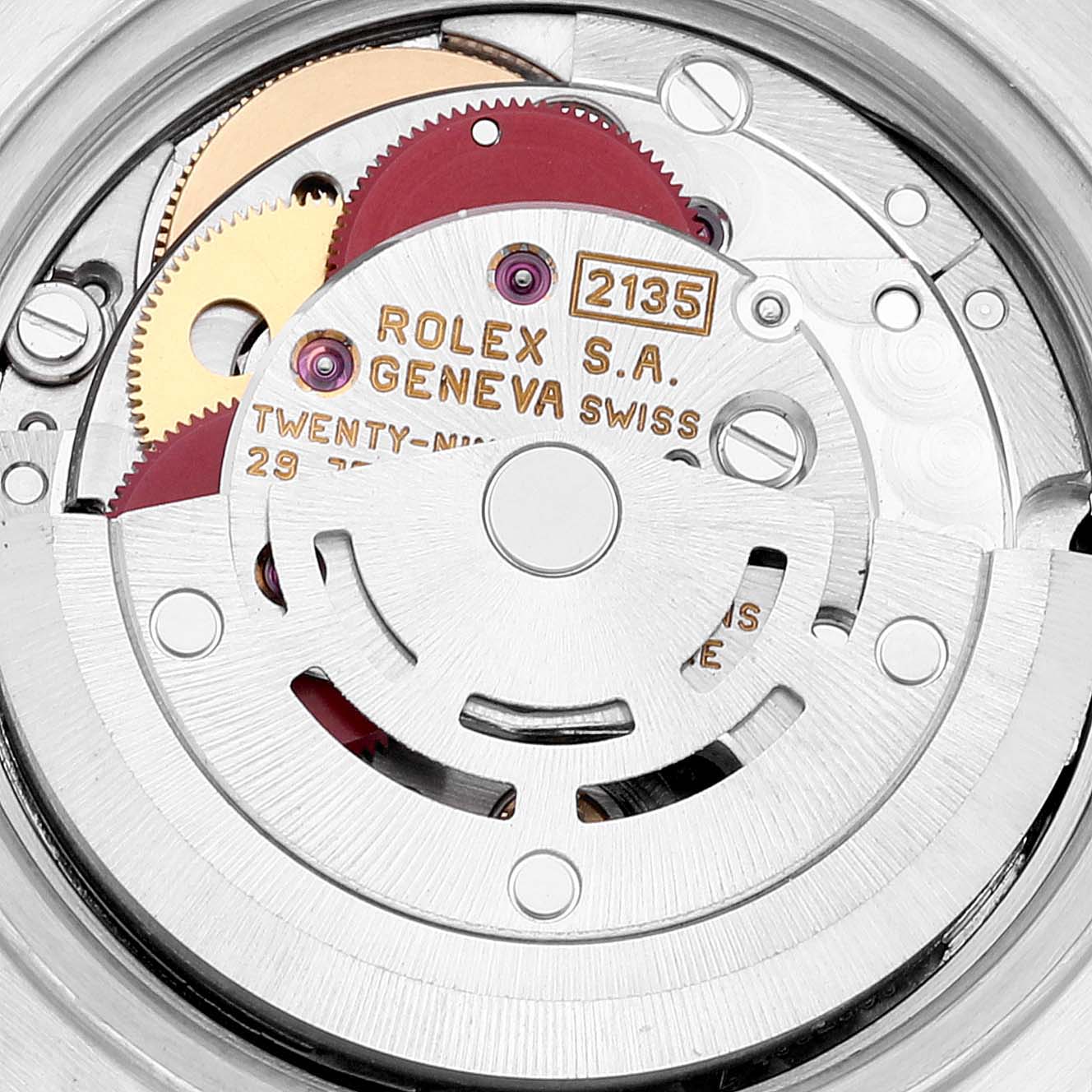 The image shows the internal movement mechanism of a Rolex Datejust 69163 Women's Steel and Gold (two tone) Black Dial 69163 Women's Steel and Gold (two tone) Black Dial watch, highlighting gears and the rotor.