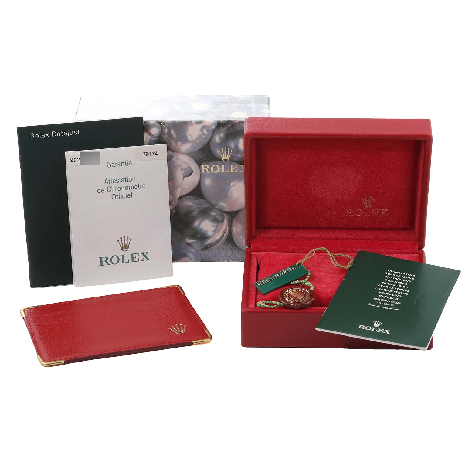 The image shows a Rolex Datejust 79174 Women's Stainless Steel Mother of Pearl Dial 79174 Women's Stainless Steel Mother of Pearl Dial watch box, warranty card, manual, tag, and outer box all arranged together.