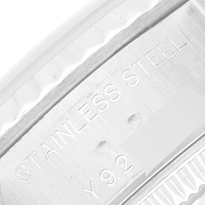 The image shows a close-up of the case with engravings on a Rolex Datejust 79174 Women's Stainless Steel Mother of Pearl Dial 79174 Women's Stainless Steel Mother of Pearl Dial watch, focusing on the stainless steel material.