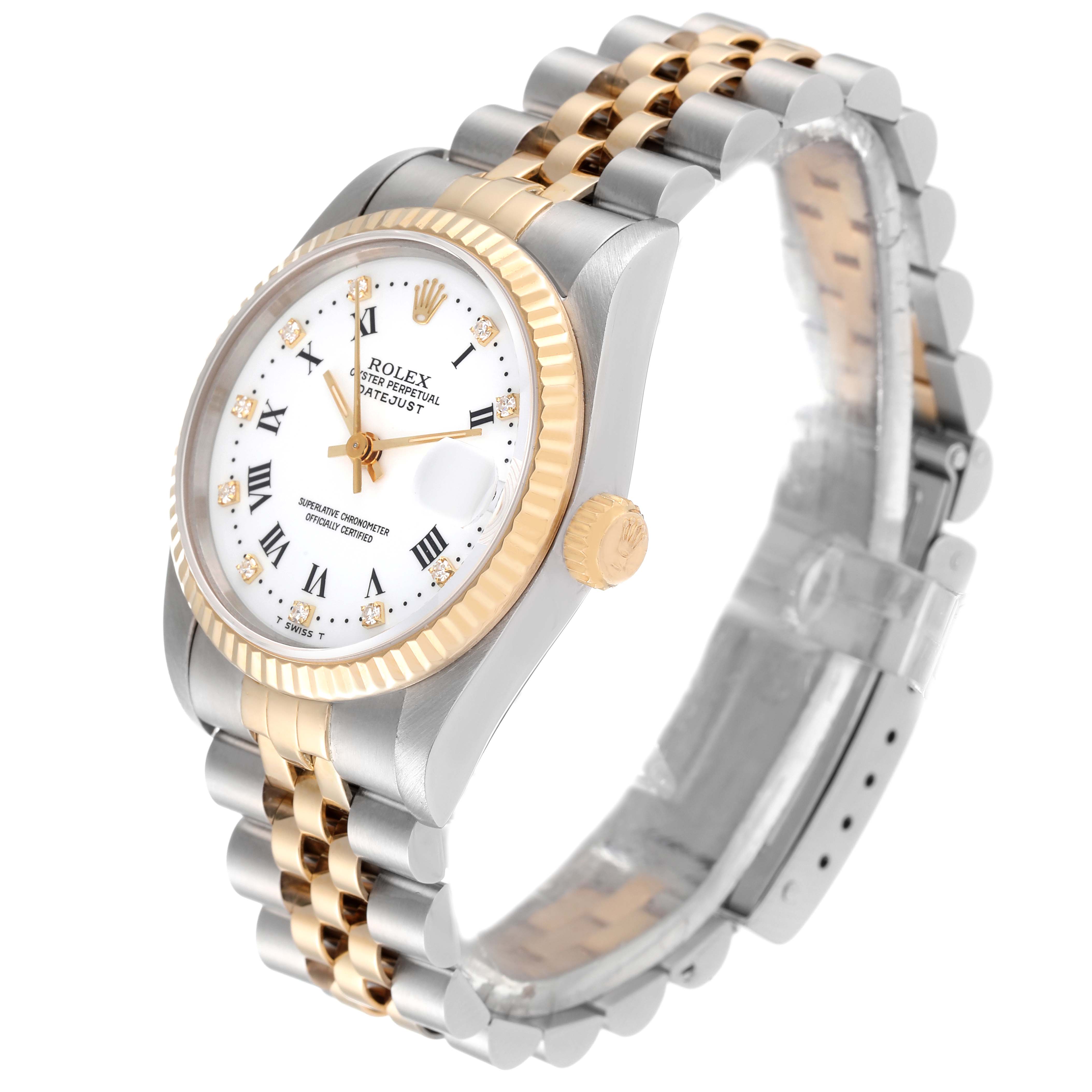 This image shows a side-angle view of a Rolex Mid-Size 68273 Women
s Steel and Gold (two tone) White Dial 68273 Women
s Steel and Gold (two tone) White Dial model watch, highlighting the bezel, dial, crown, and two-tone bracelet.
