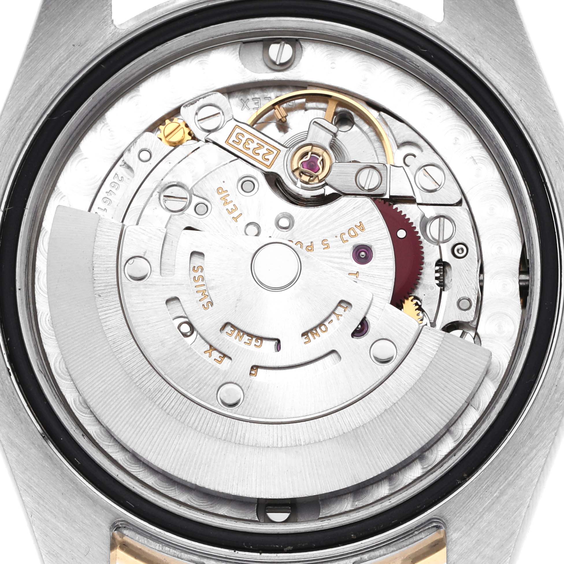 The image shows the movement and rotor of a Rolex Datejust watch from the back, highlighting the intricate internal mechanism.