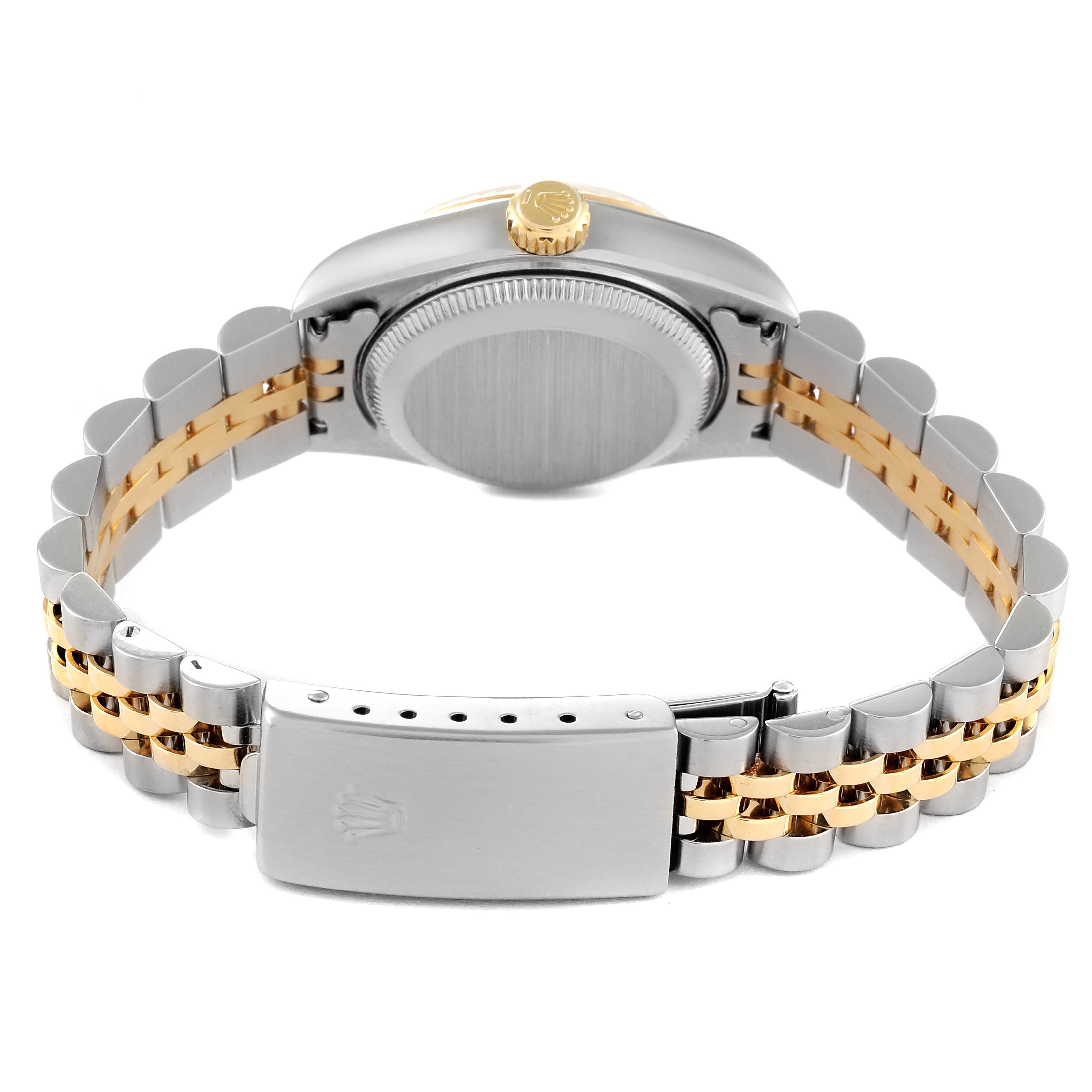 The image shows the back view of a Rolex Datejust 79173 Women's Steel and Gold (two tone) Silver Dial 79173 Women's Steel and Gold (two tone) Silver Dial watch, highlighting the case back, crown, and two-tone bracelet.
