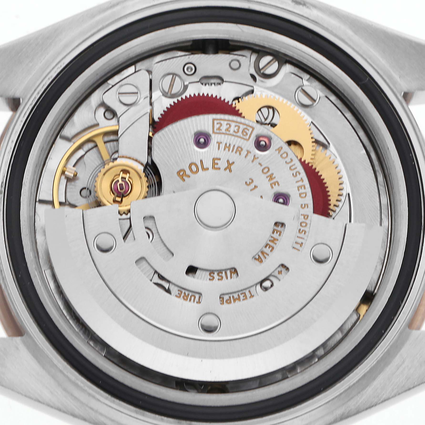 The image shows the movement of a Rolex Datejust 279171 Women
s Steel and Gold (two tone) Purple Dial 279171 Women
s Steel and Gold (two tone) Purple Dial watch from the back, highlighting gears and the rotor.