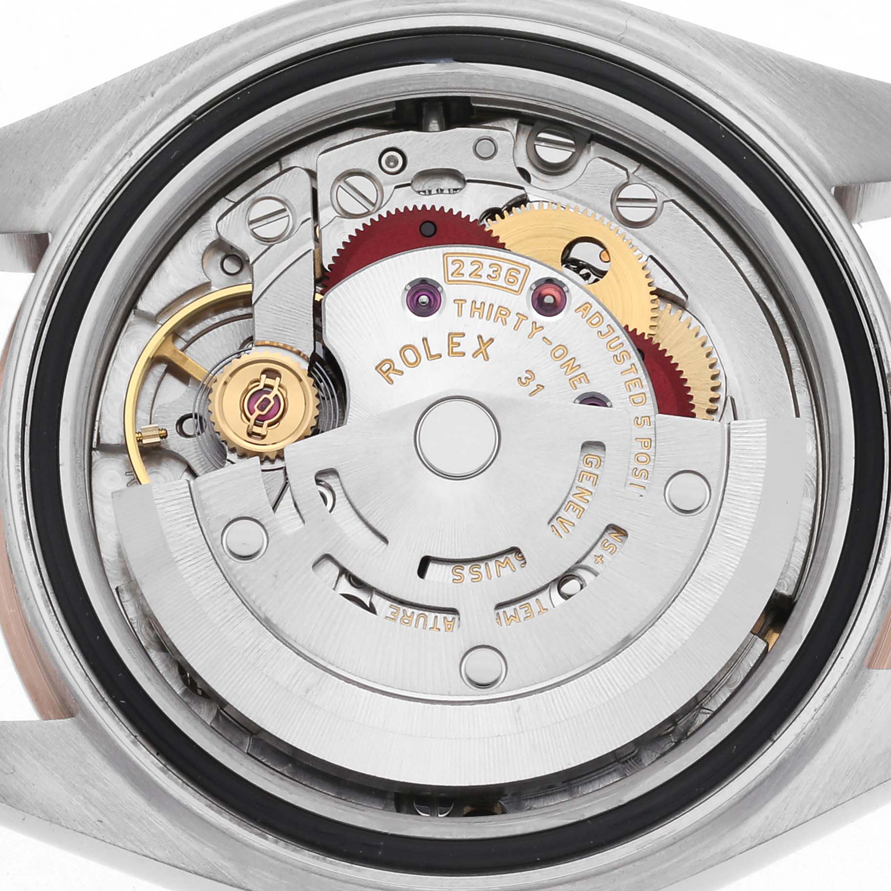 This image shows the movement of a Rolex Datejust 279171 Women
s Steel and Gold (two tone) Purple Dial 279171 Women
s Steel and Gold (two tone) Purple Dial watch from the back, highlighting gears and inscriptions.