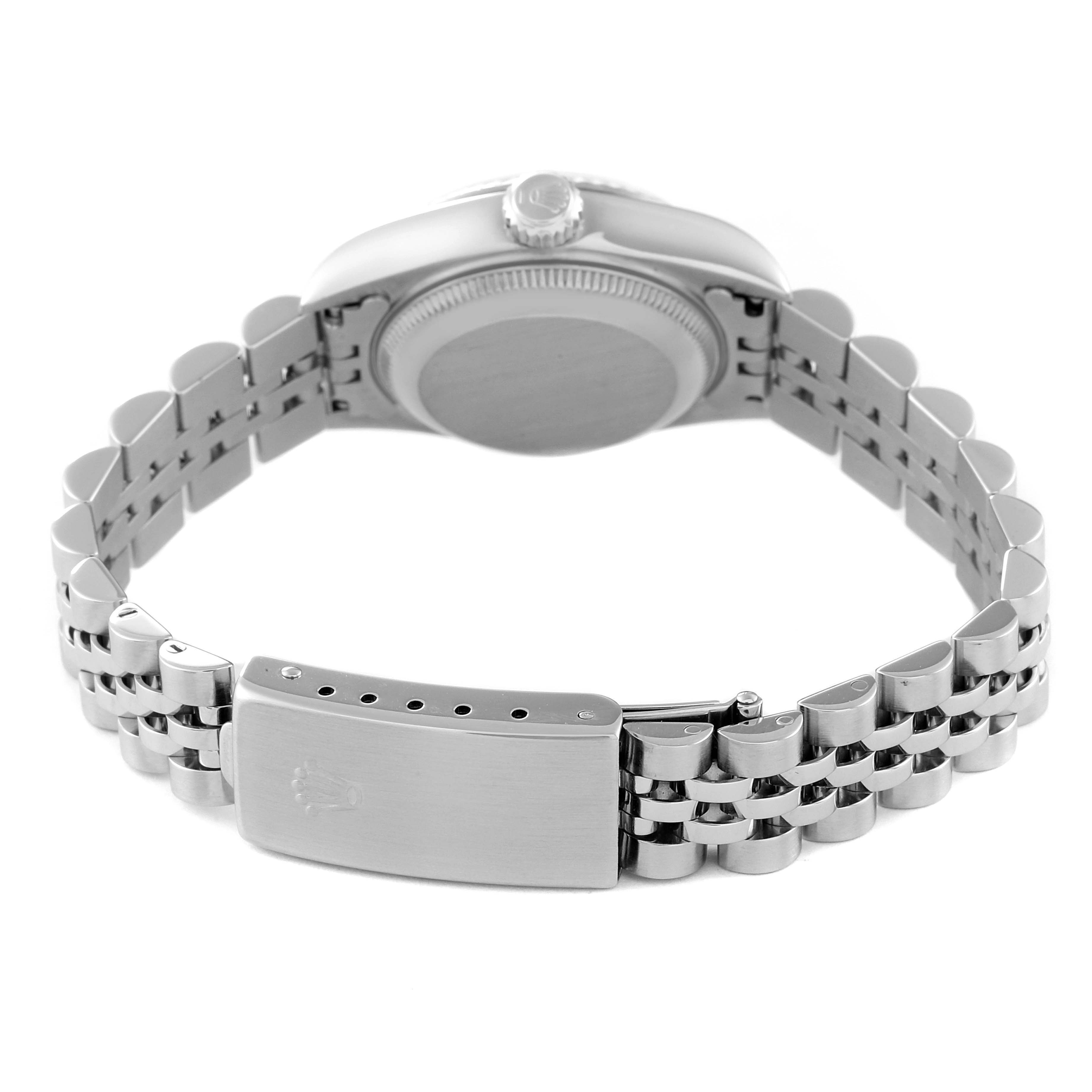 The image shows the back of a Rolex Datejust 69174 Women's Stainless Steel Silver Dial 69174 Women's Stainless Steel Silver Dial watch, focusing on the case back, bezel, bracelet, and clasp.