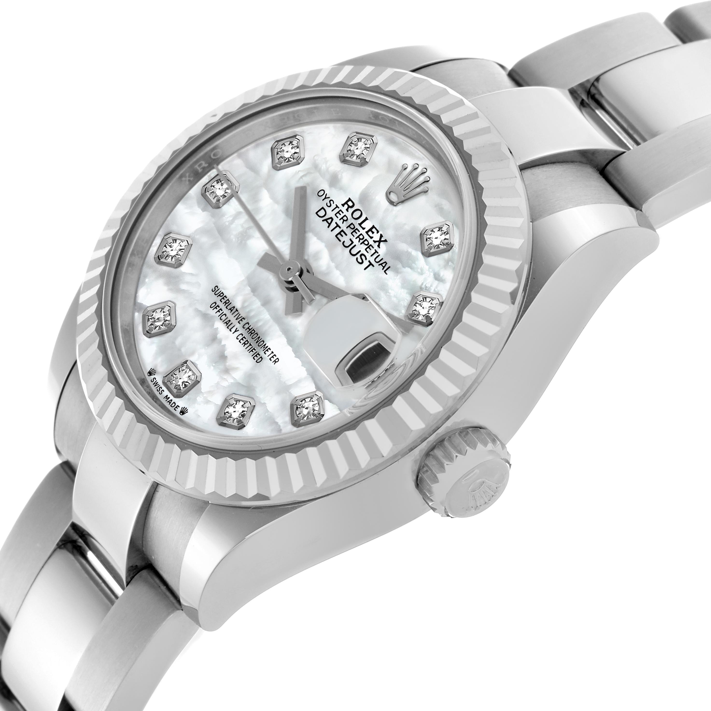 The image shows a Rolex Datejust 279174 Women
s Stainless Steel Mother of Pearl Dial 279174 Women
s Stainless Steel Mother of Pearl Dial watch at an angled view highlighting the face, bezel, crown, and part of the bracelet.