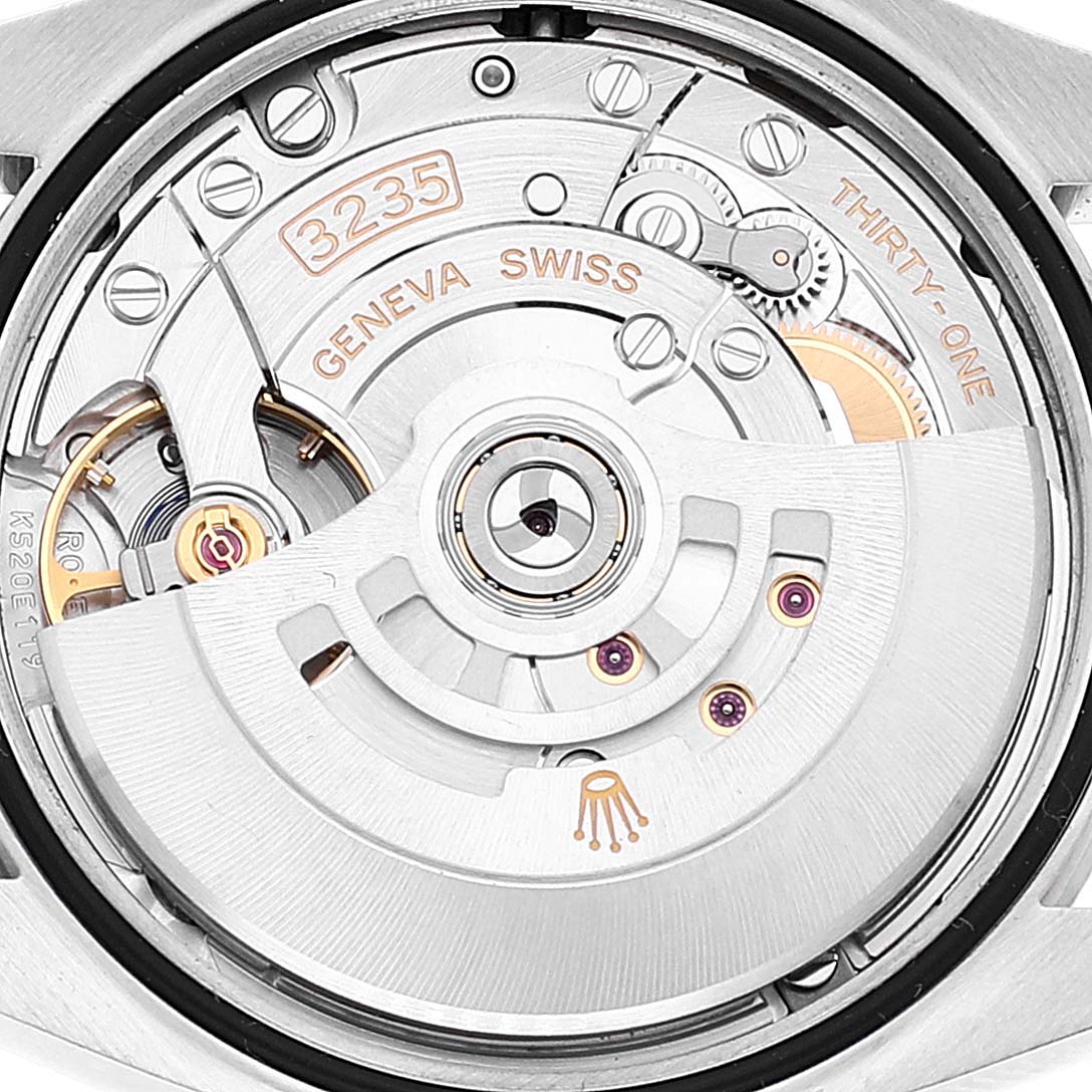 This image shows the movement mechanism of a Rolex Datejust 126234 Men's Stainless Steel Purple Dial 126234 Men's Stainless Steel Purple Dial watch viewed from the back.