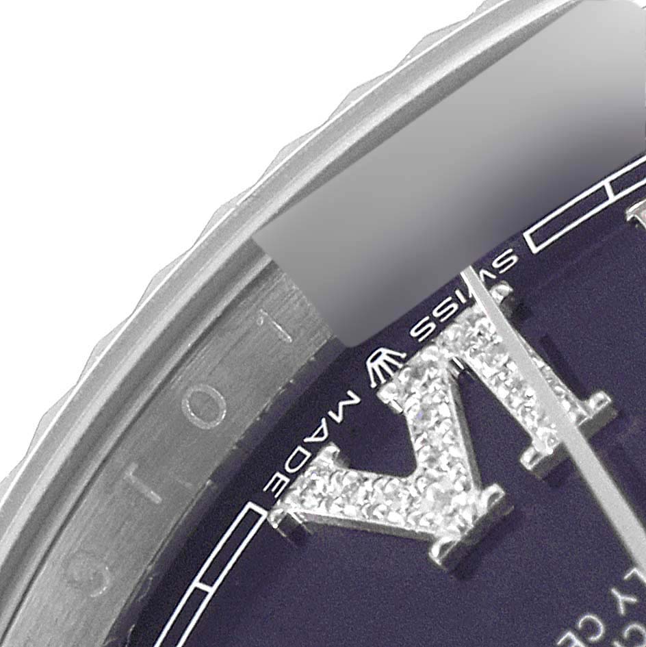 This close-up image shows part of the dial and bezel of a Rolex Datejust 126234 Men's Stainless Steel Purple Dial 126234 Men's Stainless Steel Purple Dial watch.