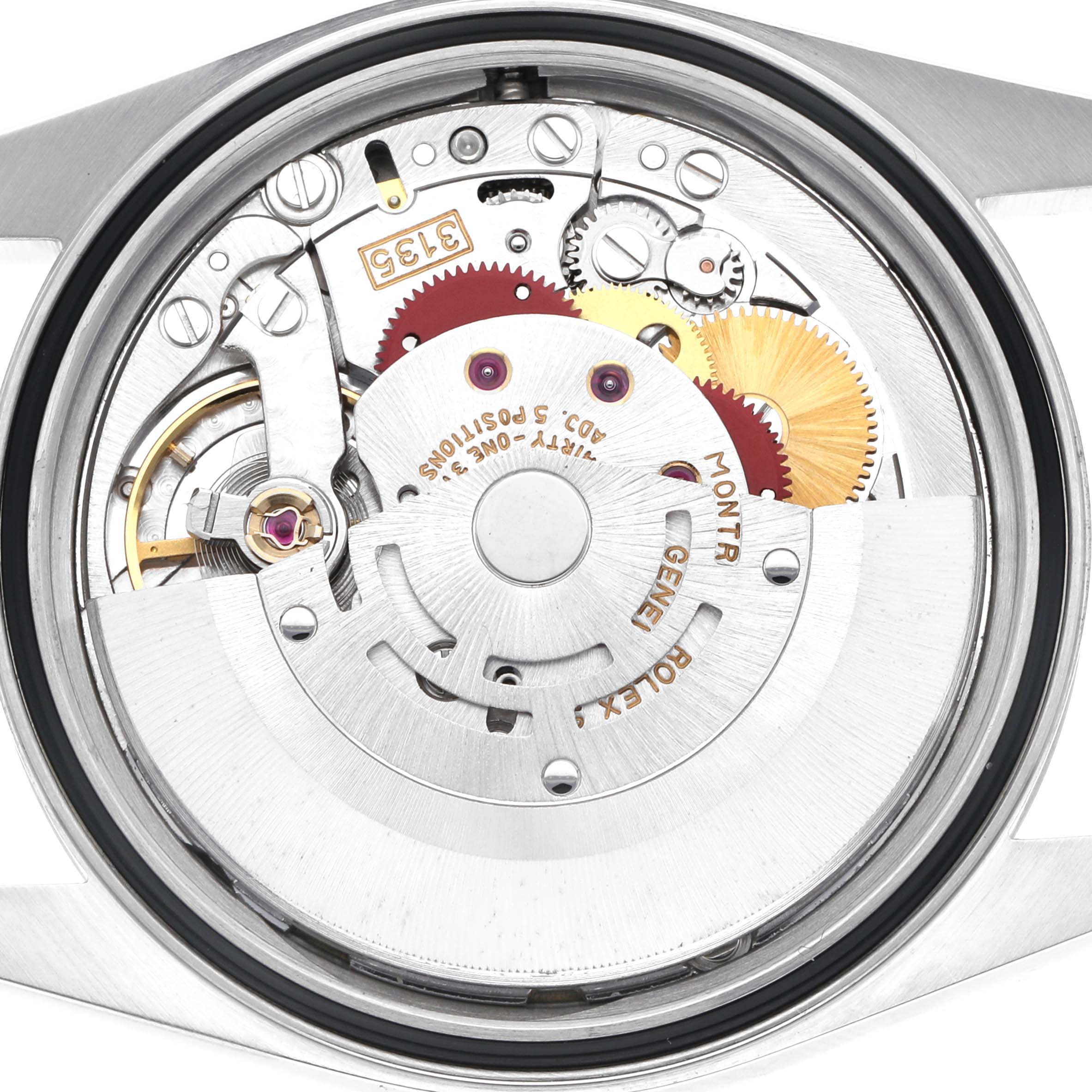 The image shows the movement of a Rolex Datejust 16234 Men
s Stainless Steel Silver Dial 16234 Men
s Stainless Steel Silver Dial, viewed from the back, highlighting the intricate gears and components.