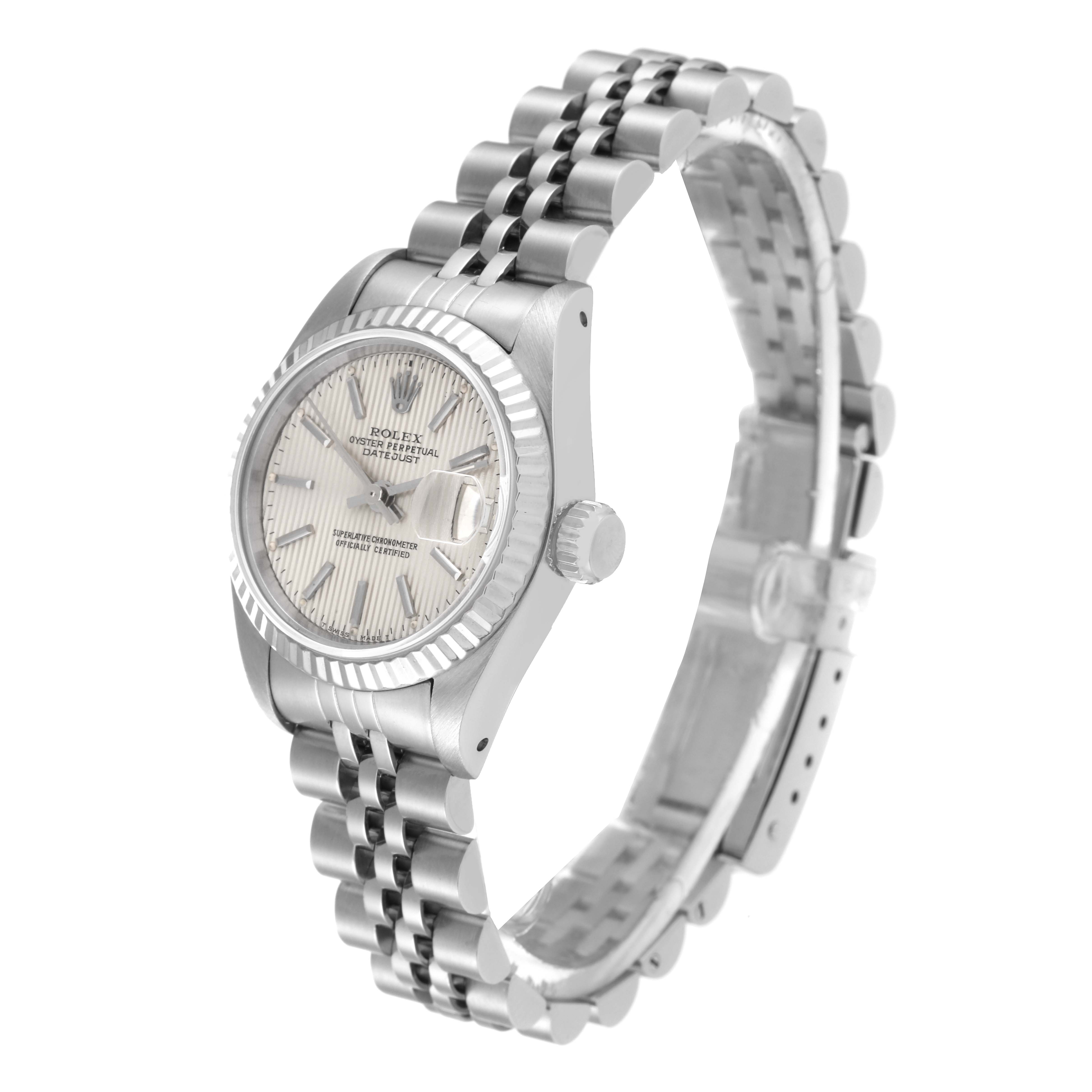 The image shows a side view of a Rolex Datejust 69174 Women's Stainless Steel Silver Dial 69174 Women's Stainless Steel Silver Dial watch, highlighting its case, dial, and Jubilee bracelet.