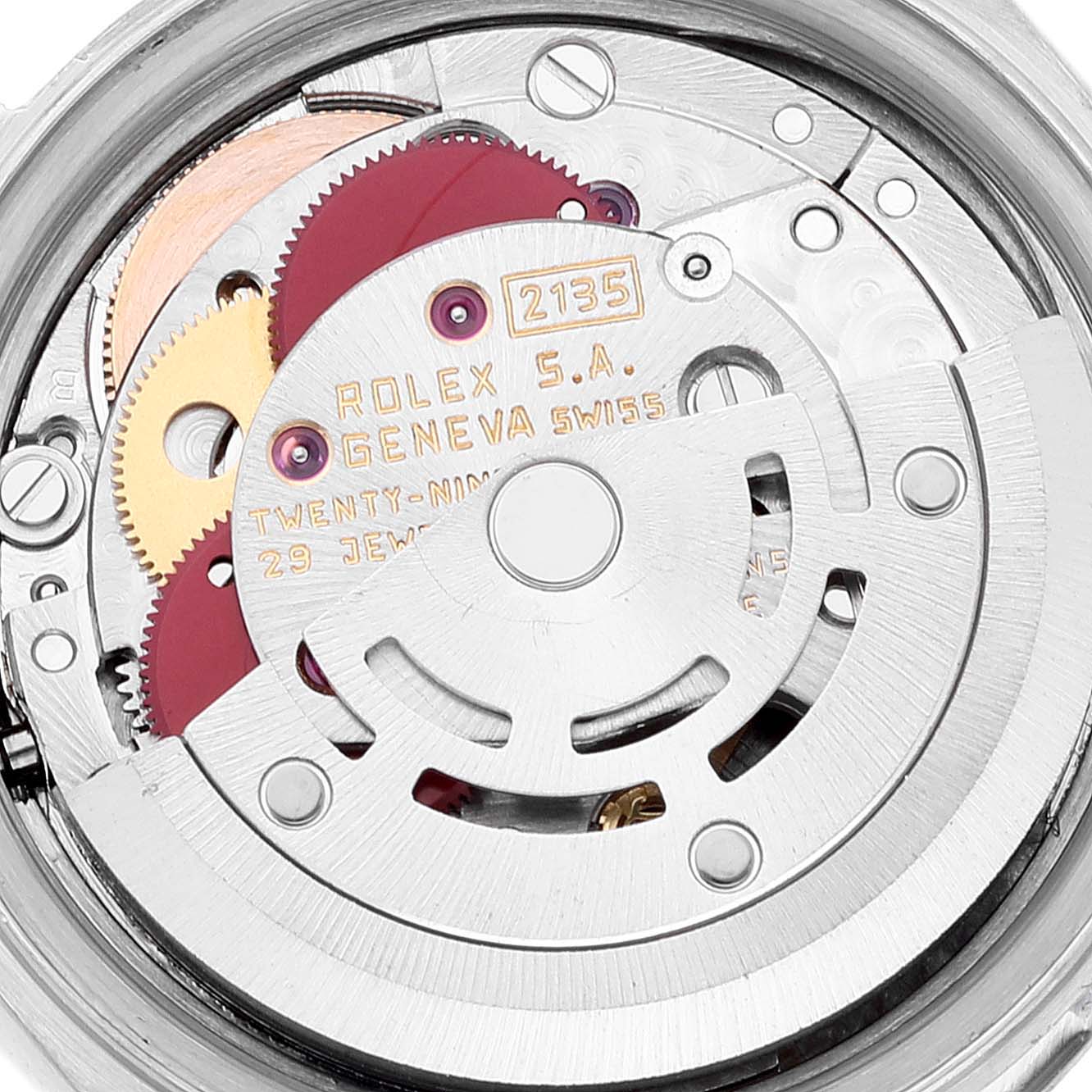 This image shows the internal mechanism of a Rolex Datejust 69174 Women's Stainless Steel Silver Dial 69174 Women's Stainless Steel Silver Dial watch, highlighting gears and engravings.