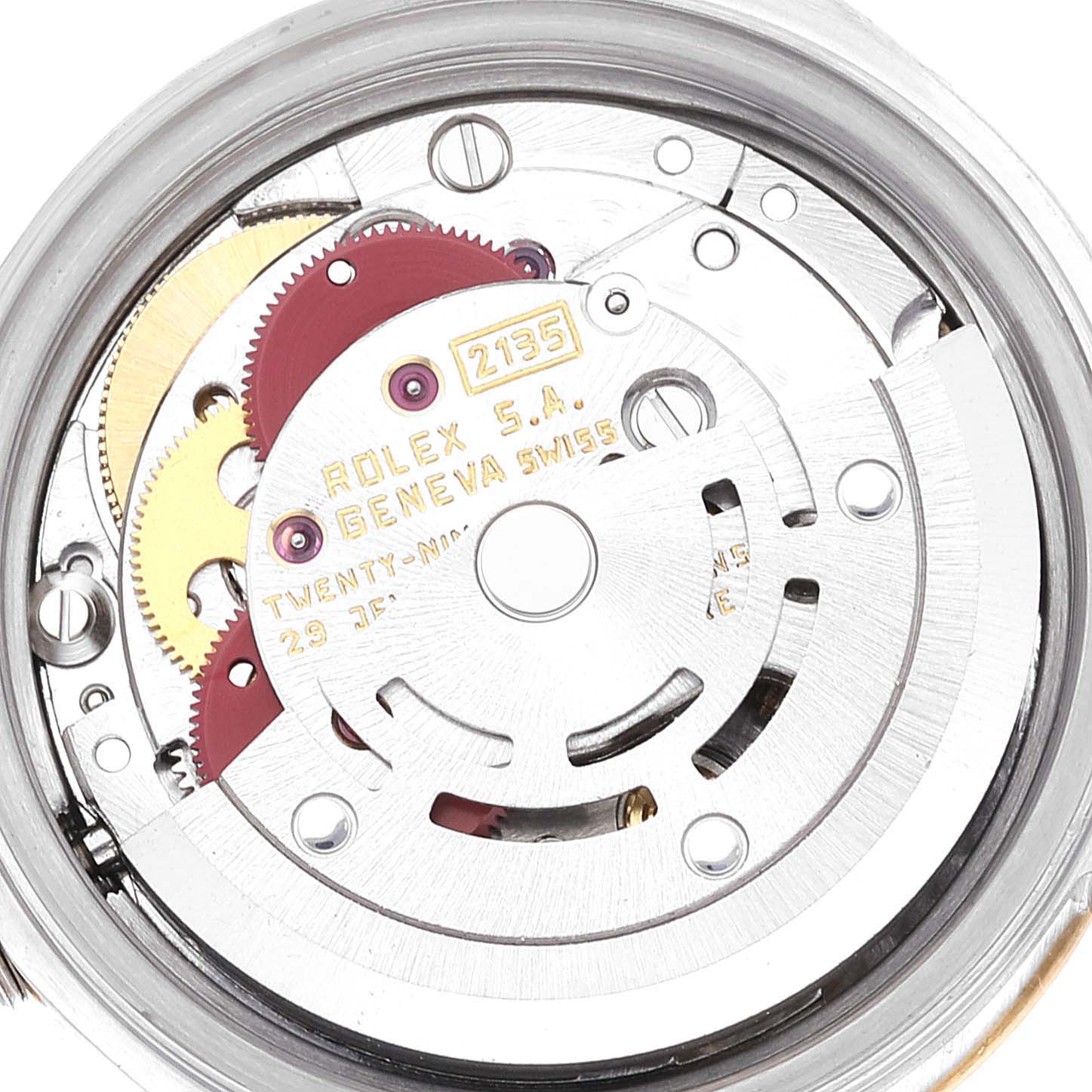 This image shows a close-up of the movement and internal components of a Rolex Datejust 69173 Women's Steel and Gold (two tone) Champagne Dial 69173 Women's Steel and Gold (two tone) Champagne Dial watch.