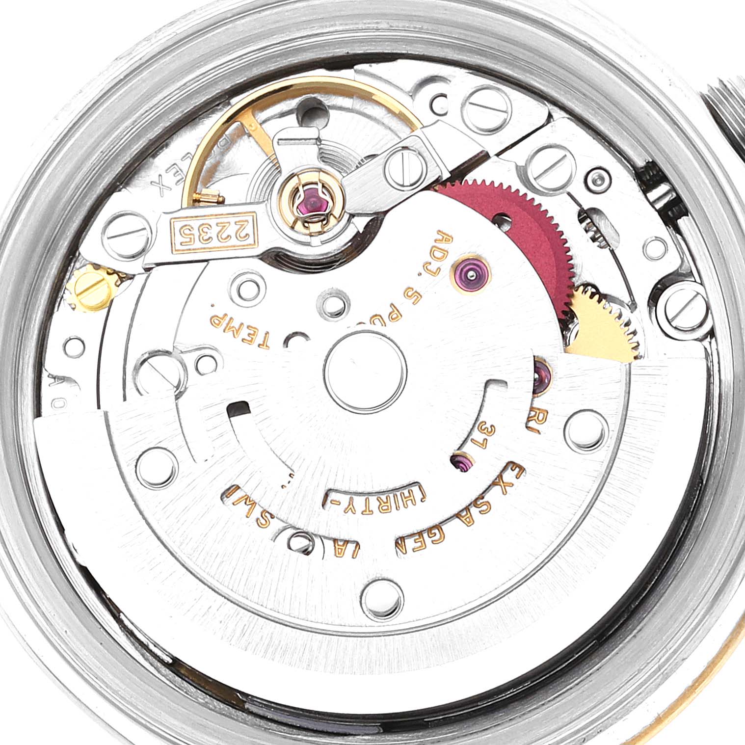This image shows an internal view of the Rolex Datejust 79173 Women's Steel and Gold (two tone) Champagne Dial 79173 Women's Steel and Gold (two tone) Champagne Dial watch movement mechanism at a close-up angle.