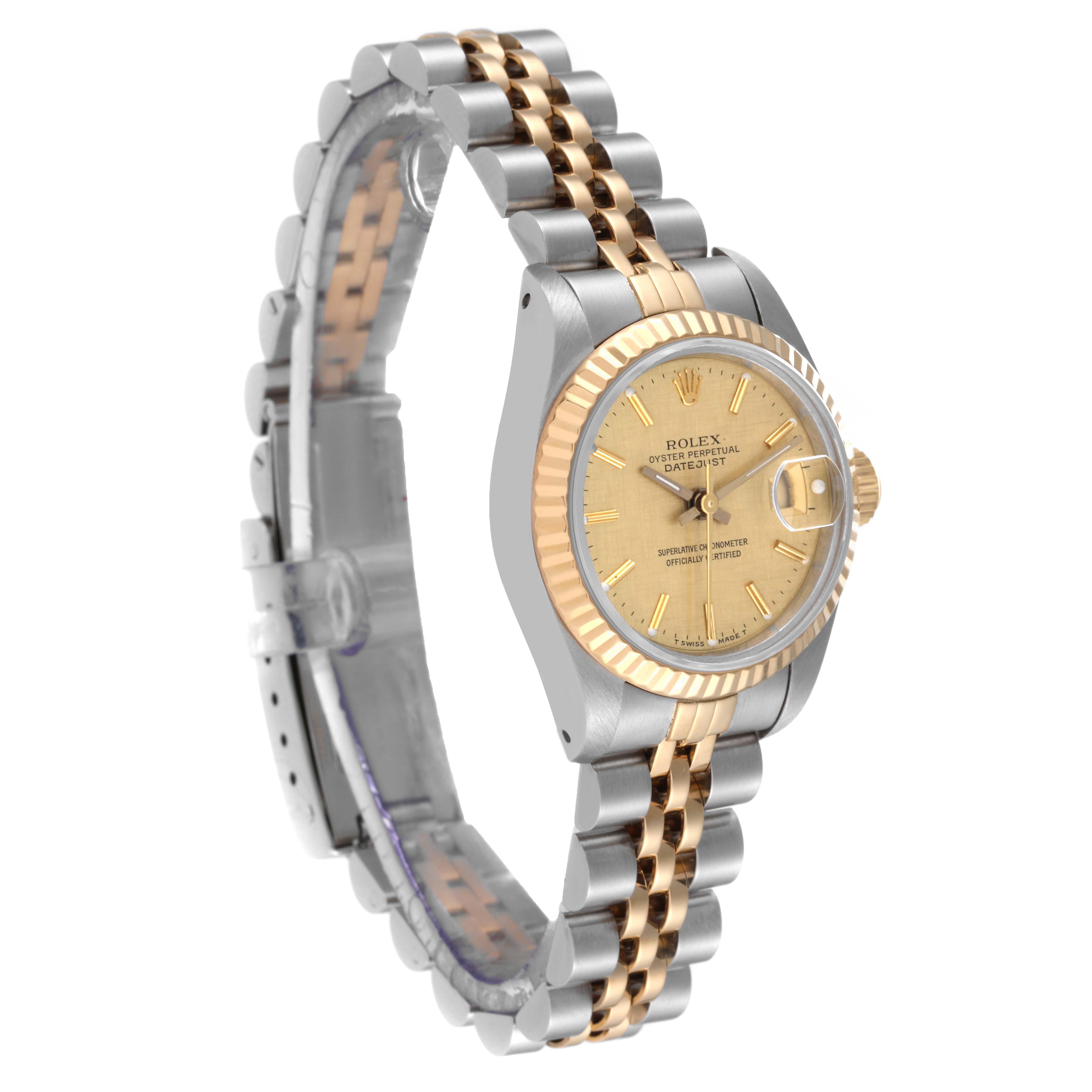 The Rolex Datejust 69173 Women's Steel and Gold (two tone) Champagne Dial 69173 Women's Steel and Gold (two tone) Champagne Dial watch is shown at an angle revealing its two-tone bracelet, dial, crown, and bezel.