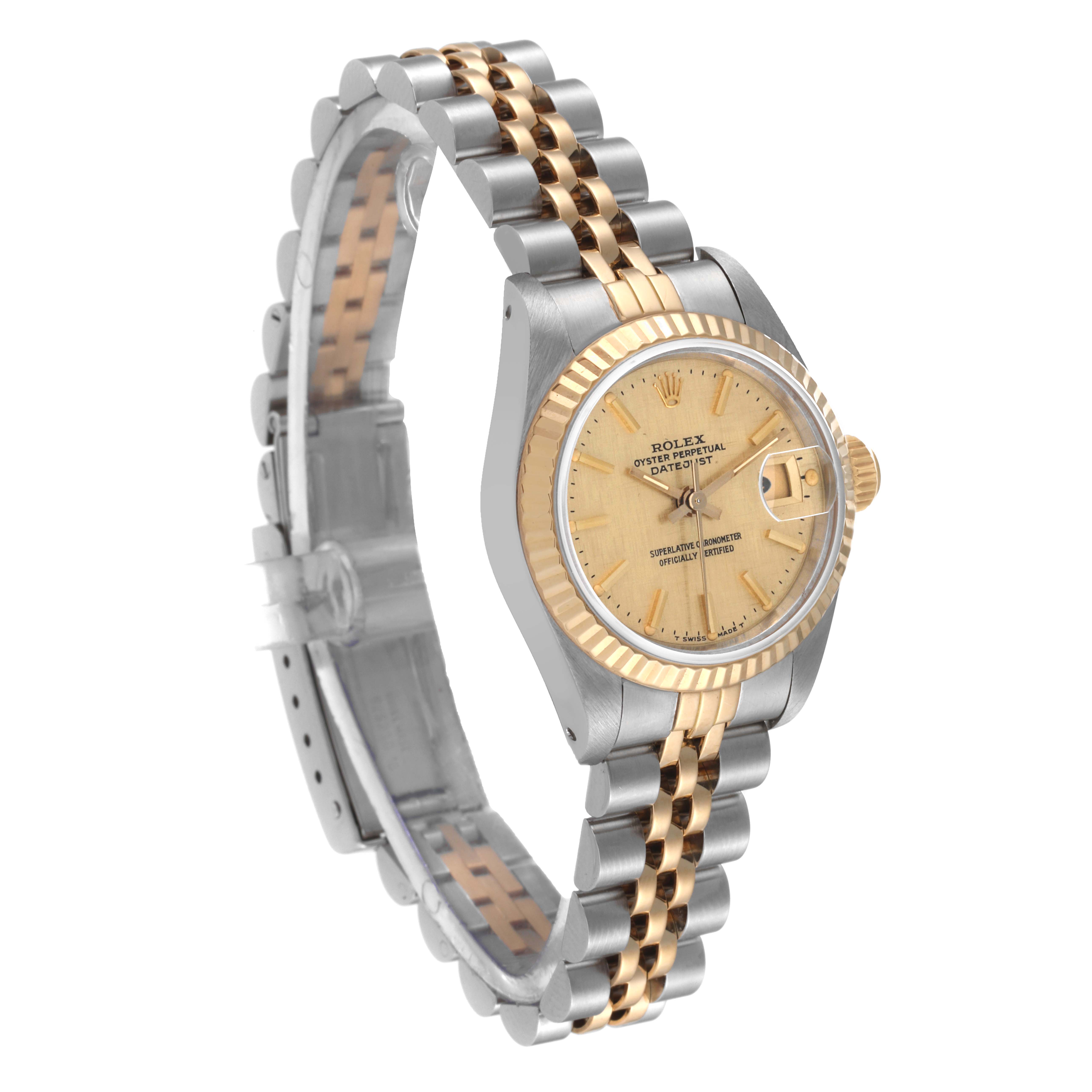 This image shows the Rolex Datejust 69173 Women's Steel and Gold (two tone) Champagne Dial 69173 Women's Steel and Gold (two tone) Champagne Dial watch at a slight angle, highlighting the dial, bezel, and two-tone bracelet.