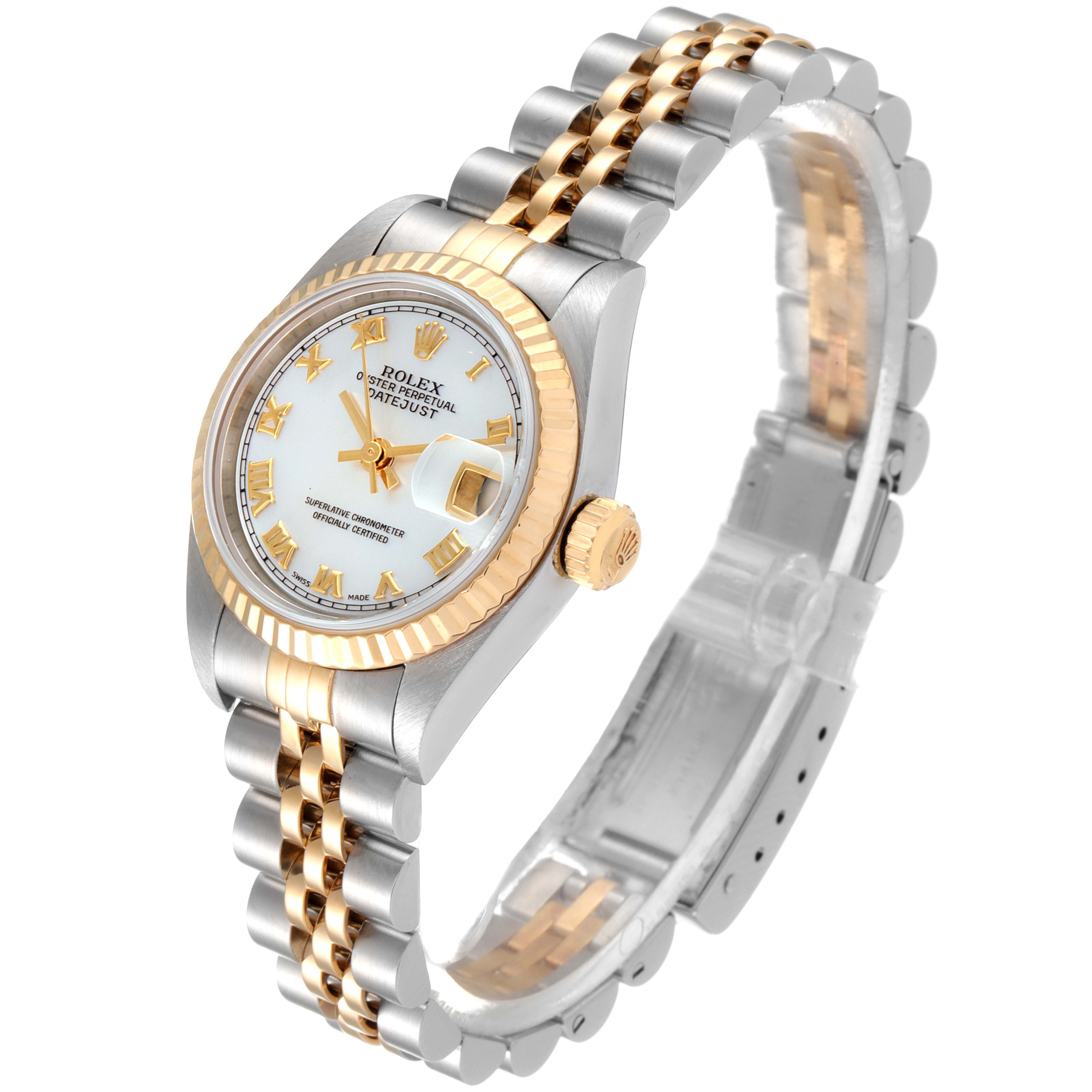 The image shows a Rolex Datejust 79173 Women
s Steel and Gold (two tone) Mother of Pearl Dial 79173 Women
s Steel and Gold (two tone) Mother of Pearl Dial watch photographed from a three-quarter angle, highlighting the dial, bezel, and bracelet.