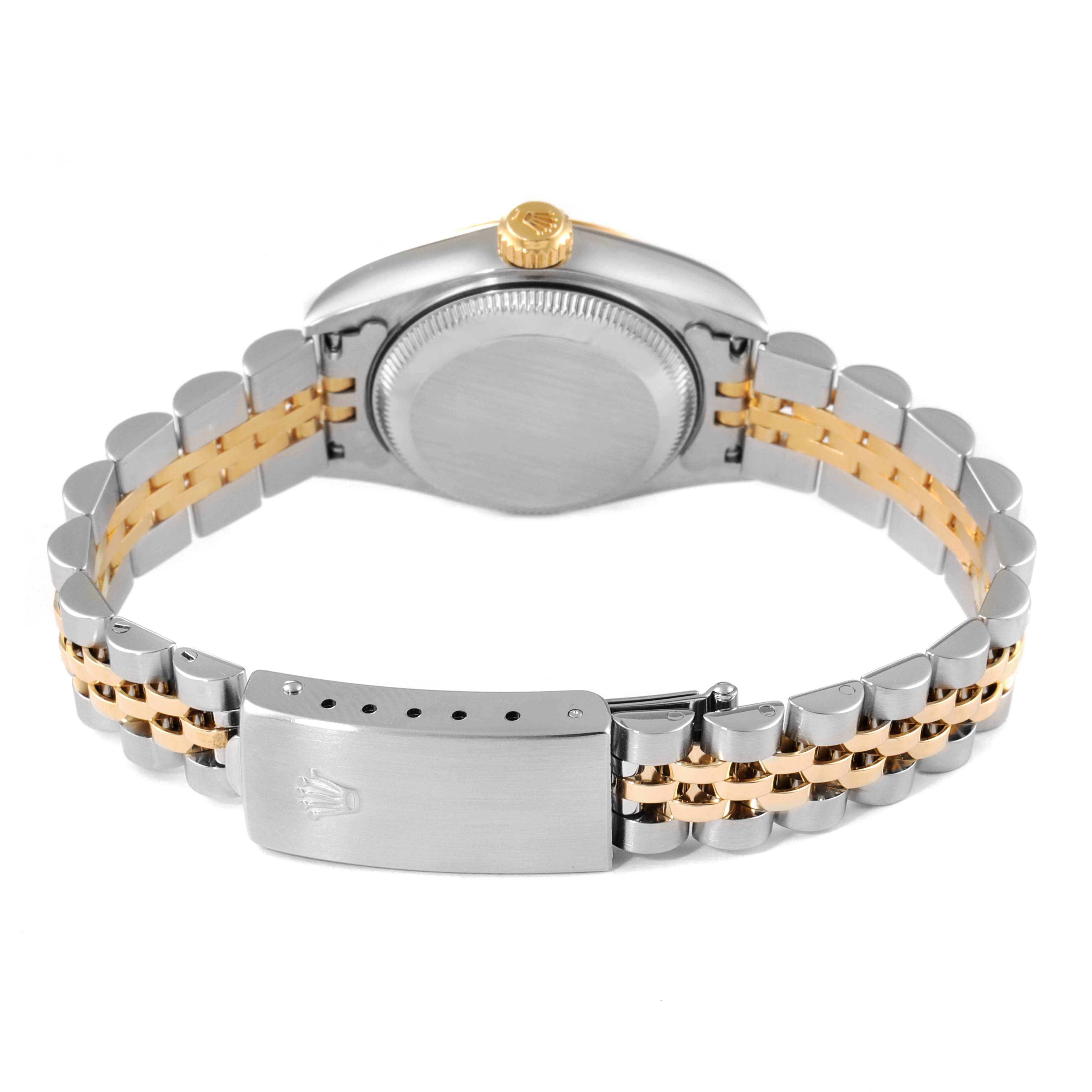 The image shows the back view of a Rolex Datejust 79173 Women
s Steel and Gold (two tone) Mother of Pearl Dial 79173 Women
s Steel and Gold (two tone) Mother of Pearl Dial watch, highlighting the clasp, bracelet, and case back.