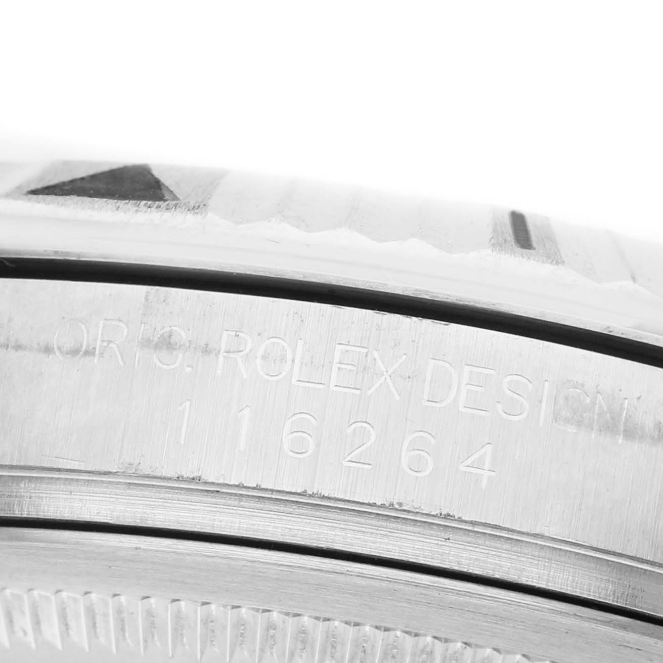 This image shows a close-up of the side of the Rolex Turn-o-Graph 116264 Men's Stainless Steel Blue Dial watch, focusing on the engraved model number.