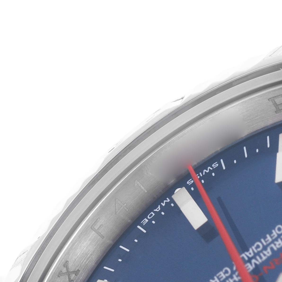 The image shows a close-up of the Rolex Turn-o-Graph 116264 Men's Stainless Steel Blue Dial watch, highlighting the bezel, partial dial, and second hand.