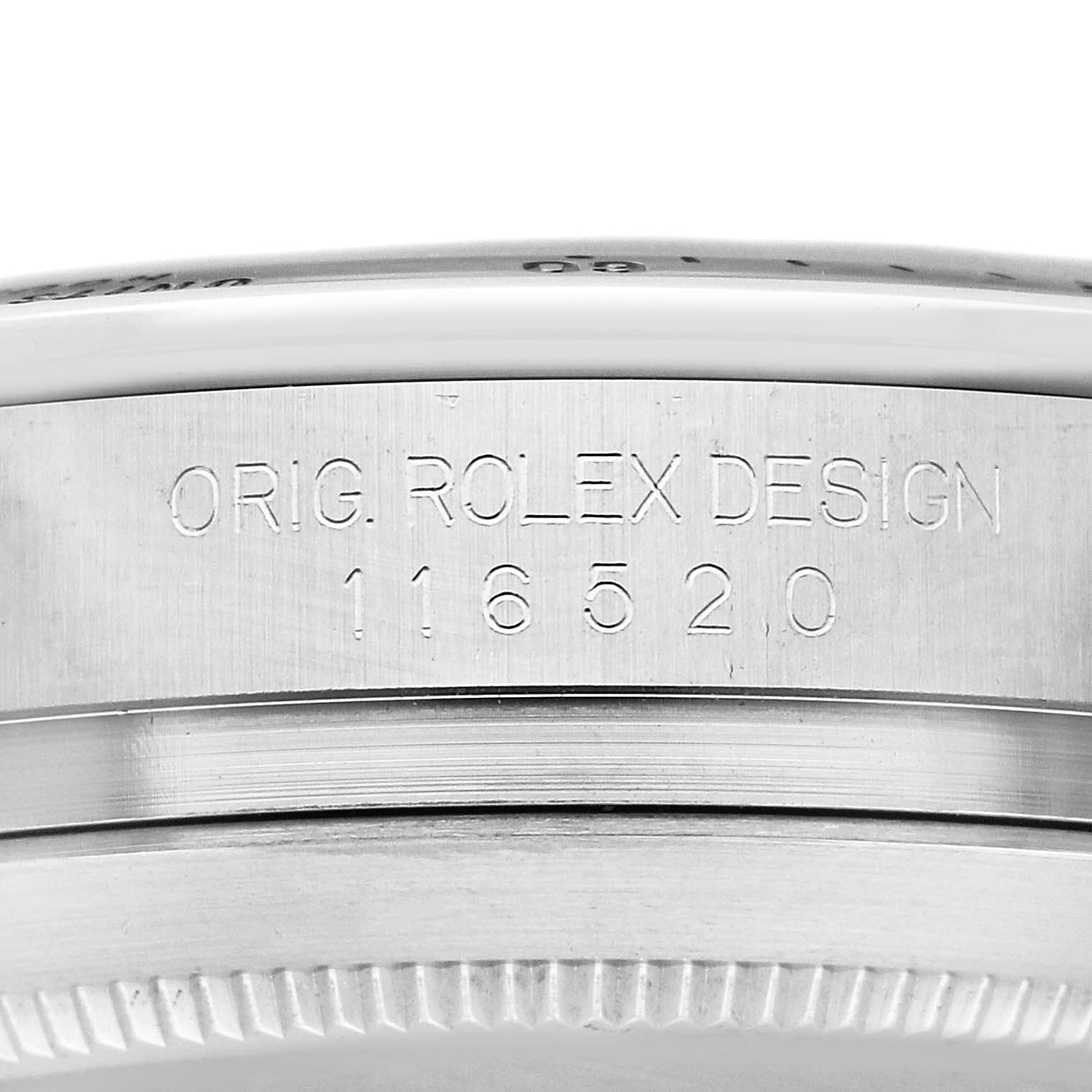 The image shows the side view of the bezel and case edge of a Rolex Daytona 116520 Men's Stainless Steel Black Dial 116520 Men's Stainless Steel Black Dial, highlighting the "ORIG. ROLEX DESIGN" engraving.