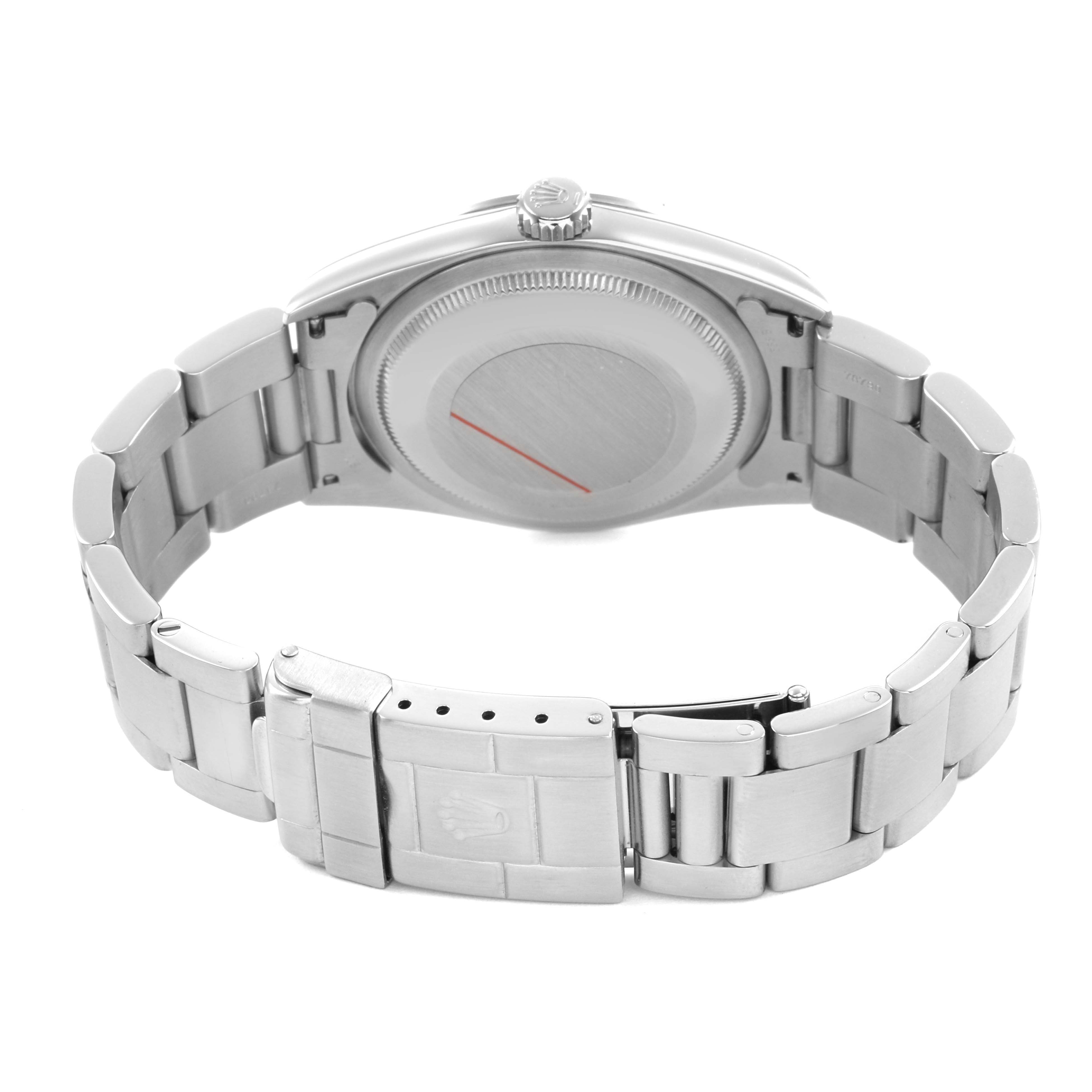 The image shows the reverse side of a Rolex Explorer 14270 Men's Stainless Steel Black Dial, highlighting the closed clasp and stainless steel bracelet.