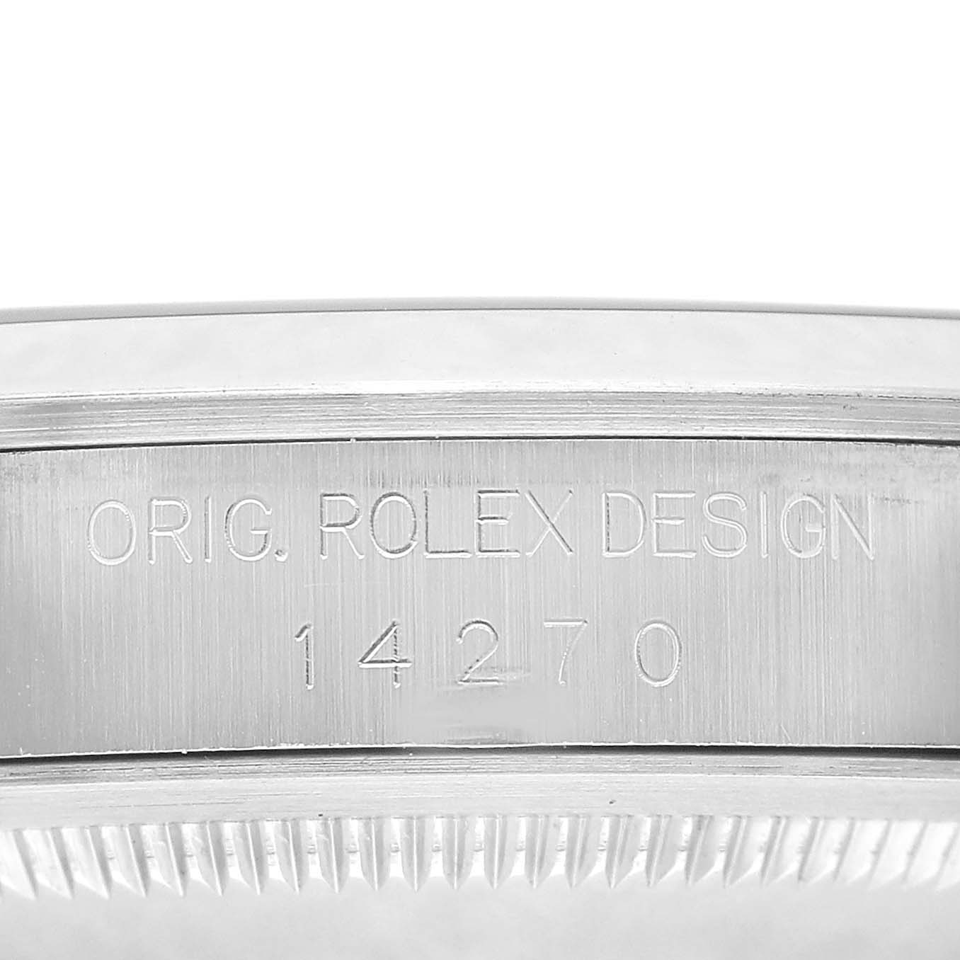 The image shows a close-up of the side of a Rolex Explorer 14270 Men's Stainless Steel Black Dial watch, featuring engraved text with its model number.