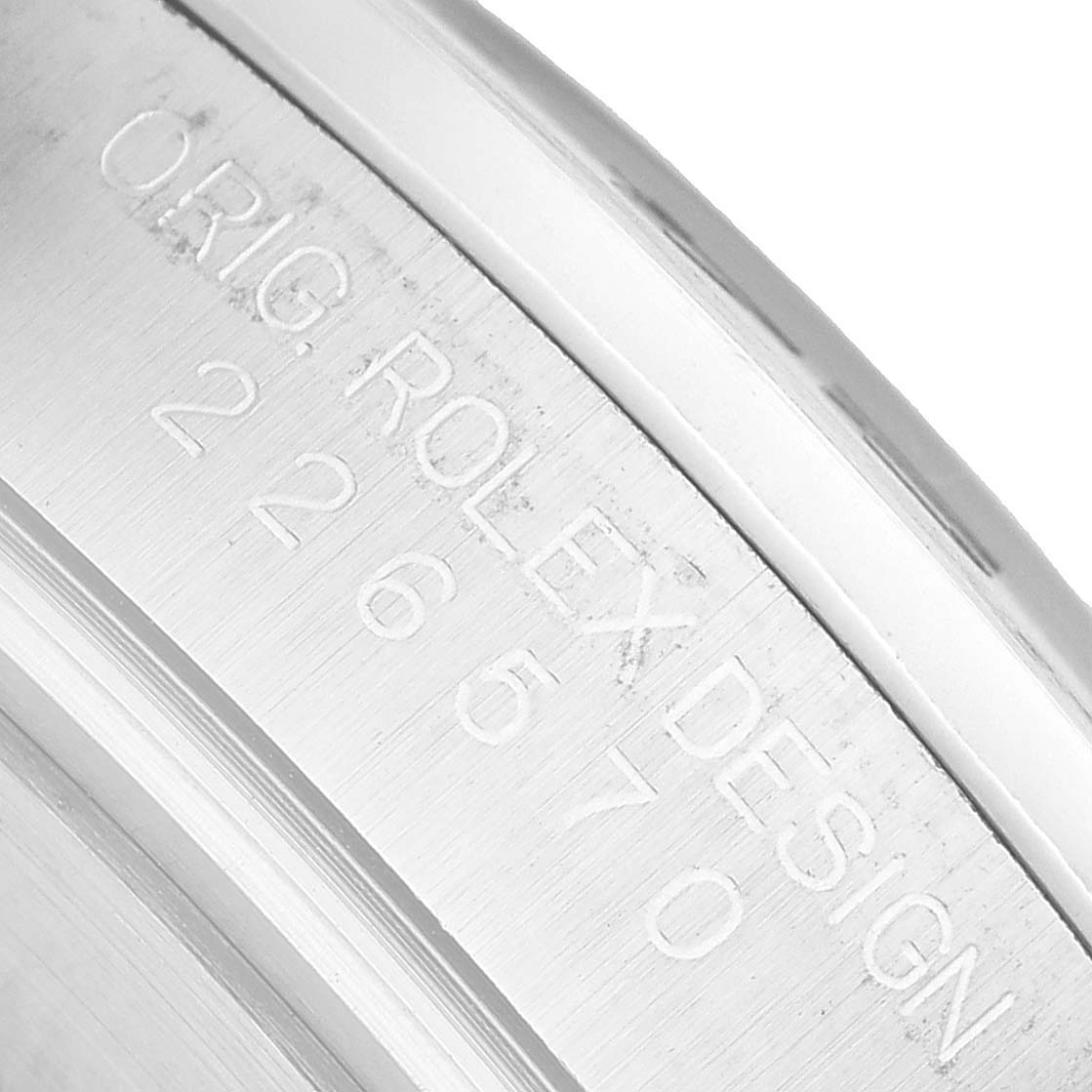 This image shows a close-up of the case side of a Rolex Explorer 226570 Men's Stainless Steel Black Dial, focusing on the engraved model details.