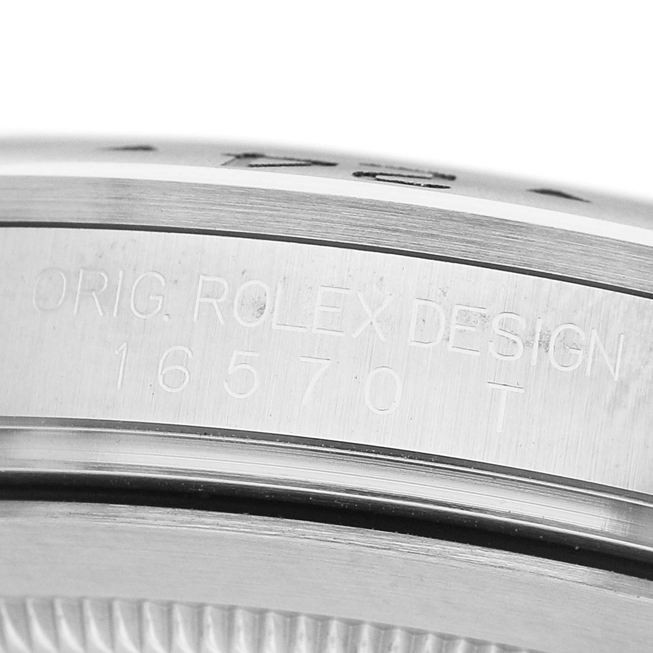 The image shows the side engraving of a Rolex Explorer 16570 T Men's Stainless Steel Black Dial model, displaying "ORIG. ROLEX DESIGN 16570 T".
