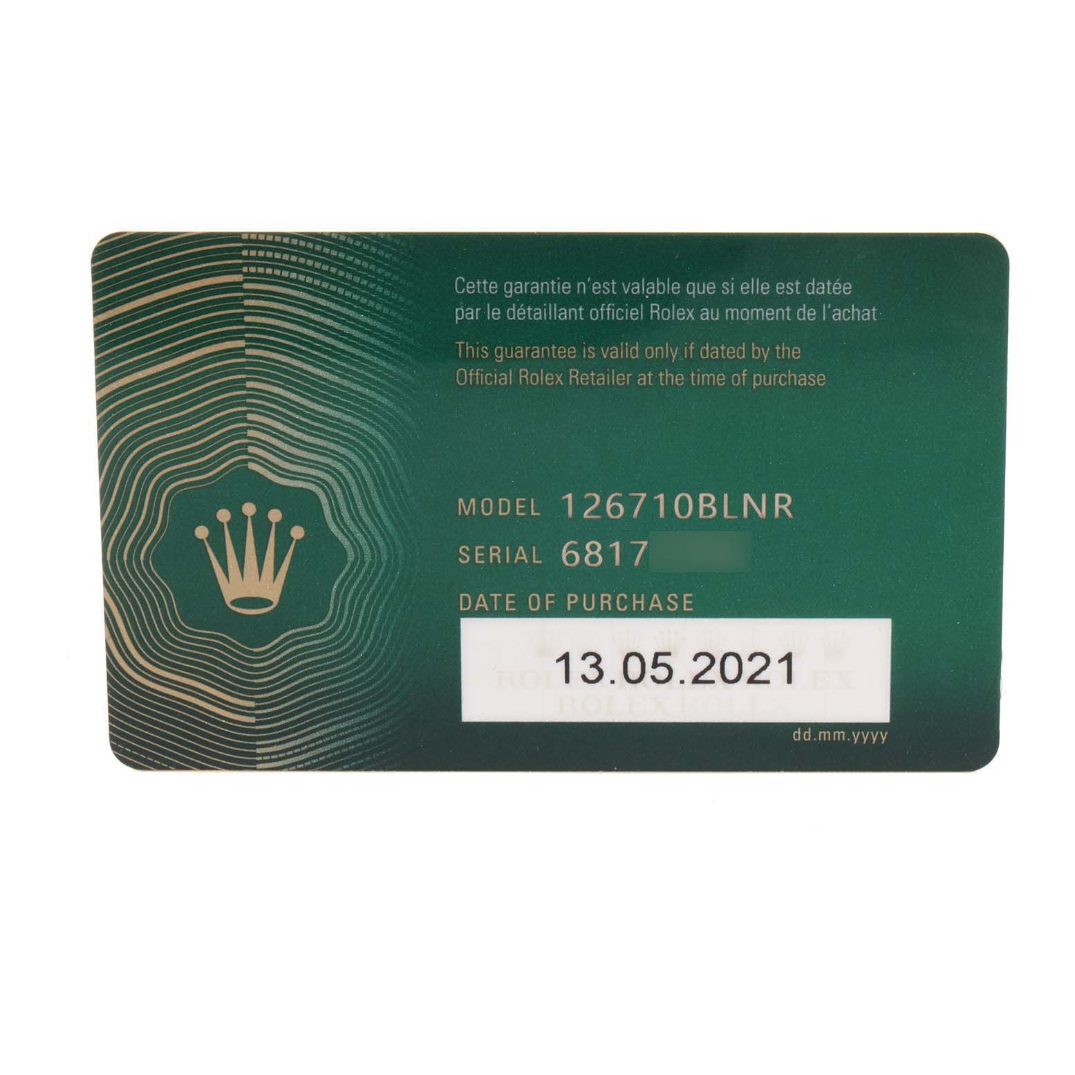 The image shows a Rolex guarantee card for the GMT-Master model 126710BLNR, displaying the purchase date and serial number.