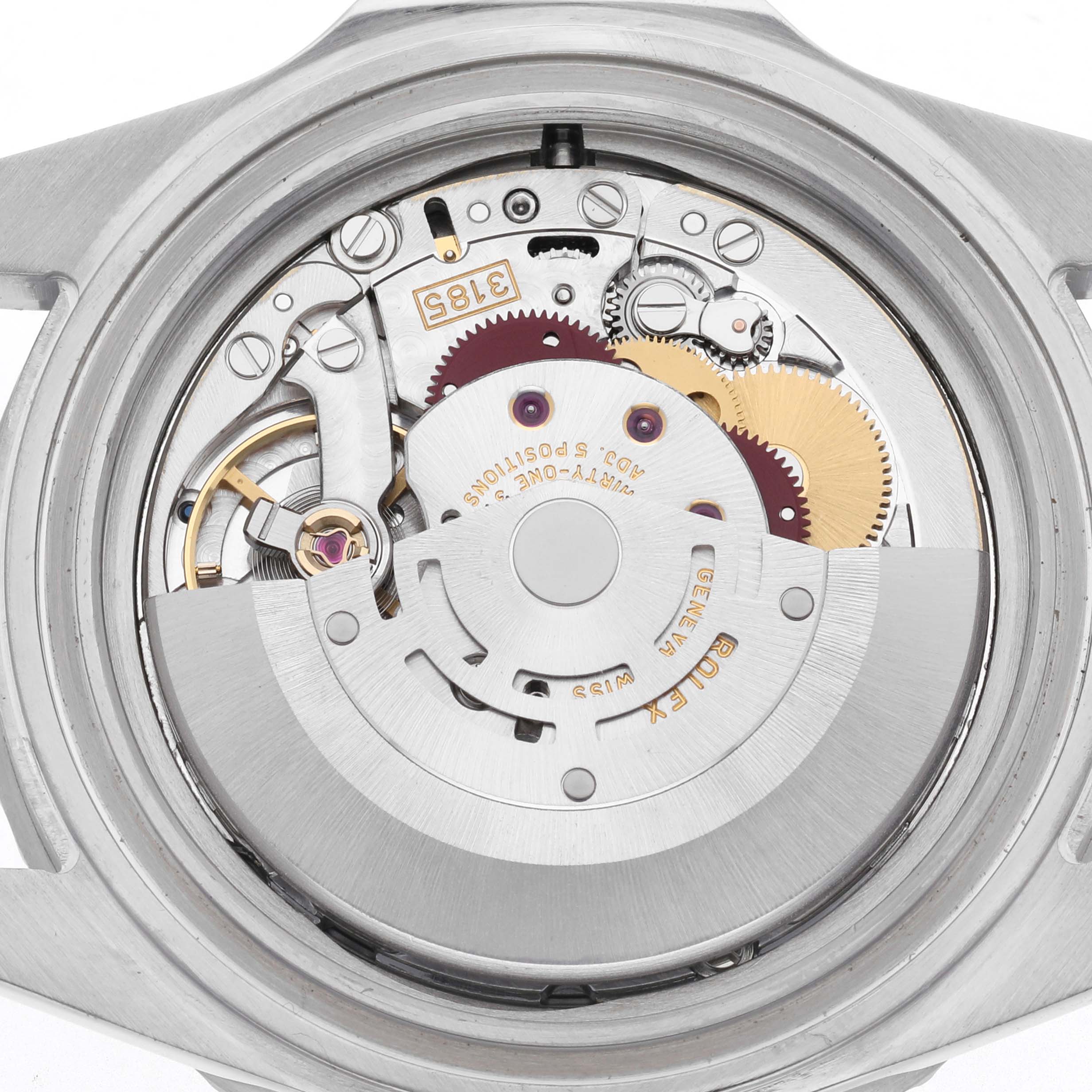 The image shows the back view of a Rolex GMT-Master 16710 Men
s Stainless Steel Black Dial 16710 Men
s Stainless Steel Black Dial watch, highlighting its internal movement and rotor.