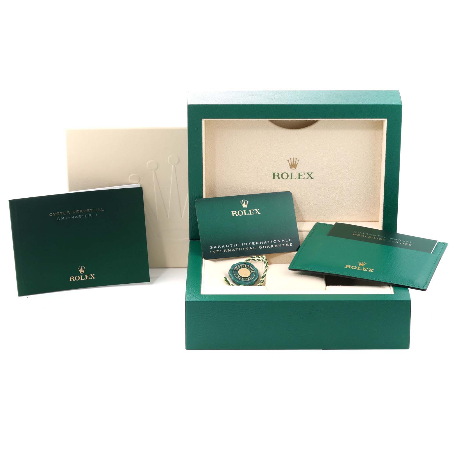 This image shows a Rolex GMT-Master 126710 Men
s Stainless Steel Black Dial 126710 Men
s Stainless Steel Black Dial watch box, guarantee card, manuals, and a tag.