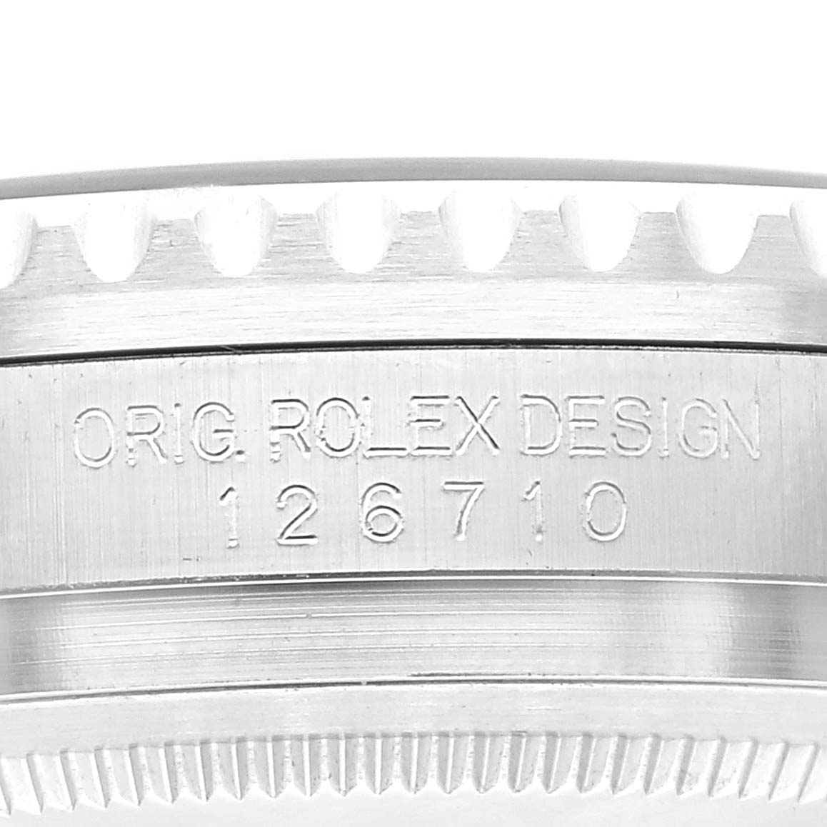 This image shows a close-up of the side case and bezel detailing of a Rolex GMT-Master 126710 Men
s Stainless Steel Black Dial 126710 Men
s Stainless Steel Black Dial with the model number 126710.