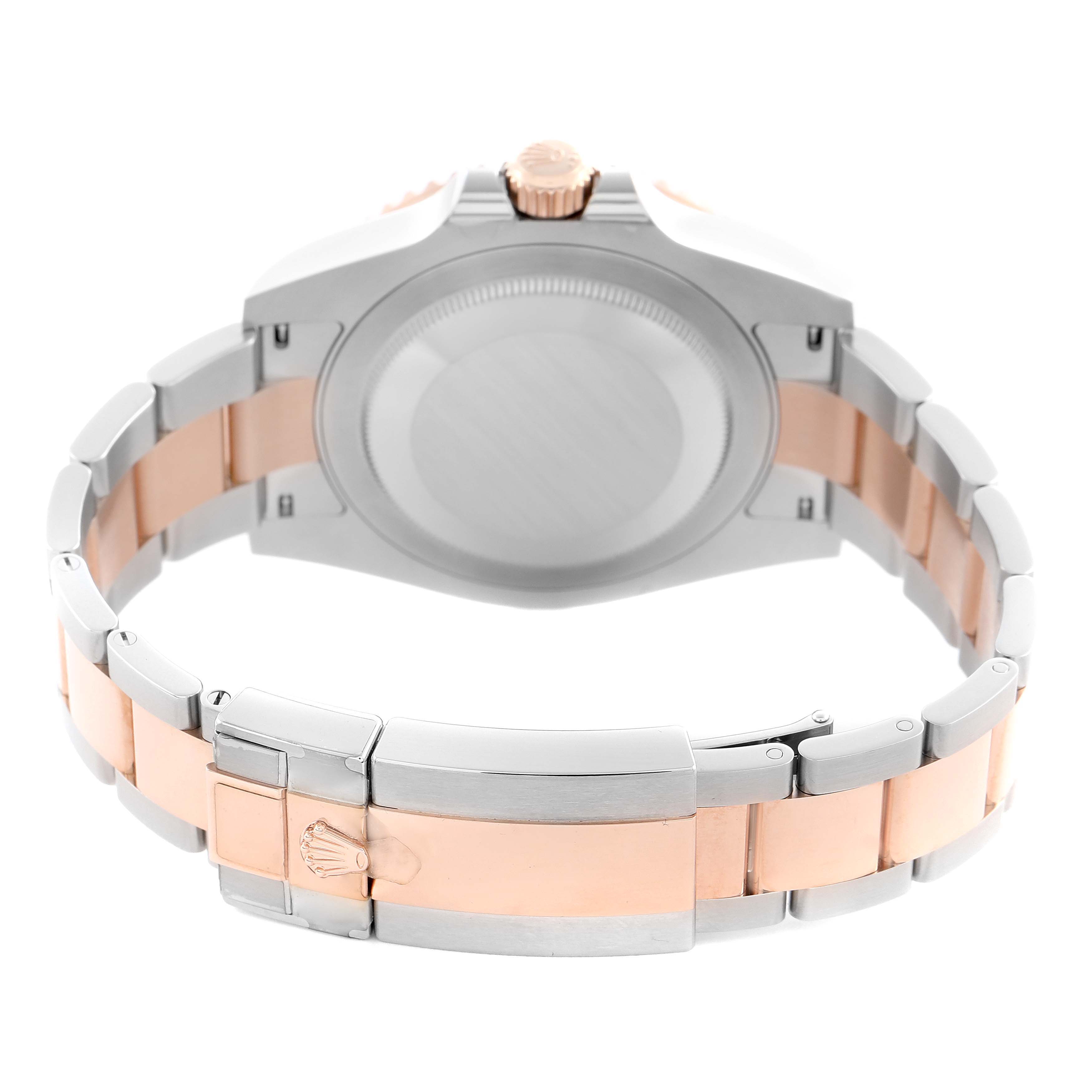 The image shows the back of a Rolex GMT-Master 126711CHNR Men
s Steel and Gold (two tone) Black Dial 126711CHNR Men
s Steel and Gold (two tone) Black Dial watch, highlighting its bracelet and clasp in a two-tone finish.