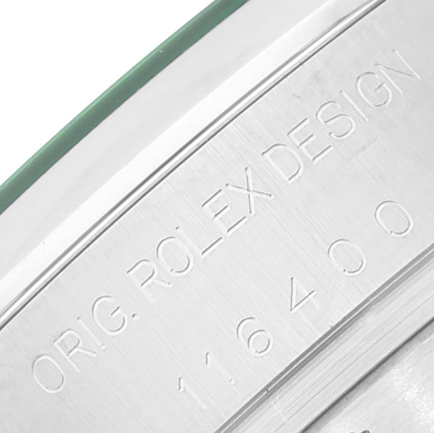 This image shows a close-up of the engraved reference number and brand on the side of a Rolex Milgauss 116400 Men's Stainless Steel Black Dial 116400 Men's Stainless Steel Black Dial watch case.
