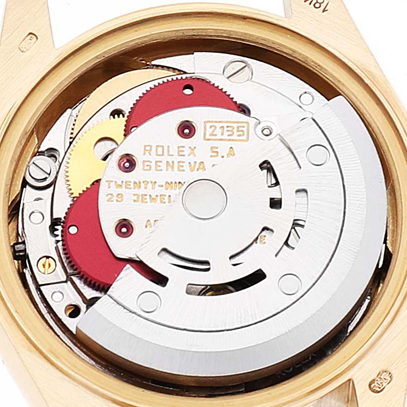 This is a close-up view of the internal mechanism of a Rolex President 69188 Women's Yellow Gold Champagne Dial 69188 Women's Yellow Gold Champagne Dial model watch.